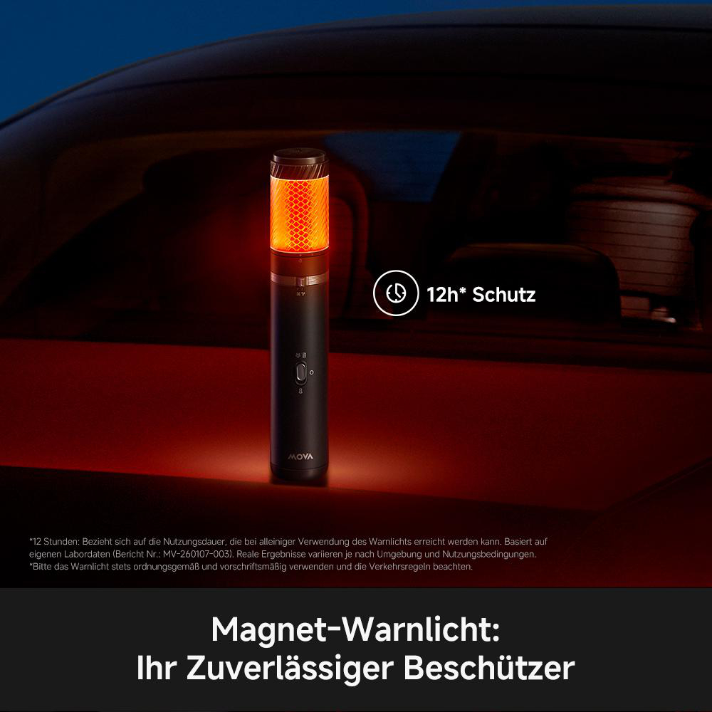 Ein oranges Warnlicht auf einem schwarzen Stab neben einem Auto. Es leuchtet.