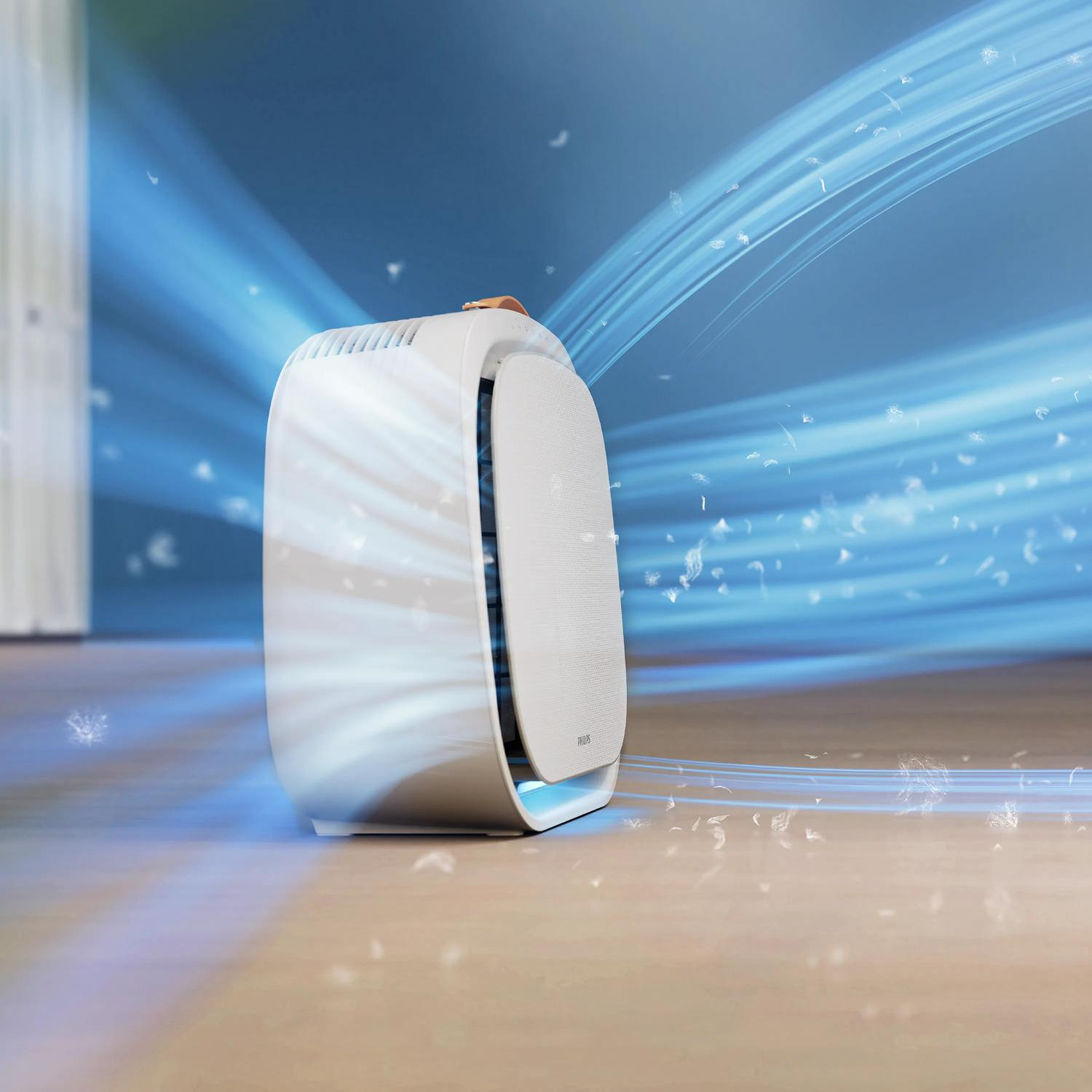 Un purificateur d'air blanc filtre les particules de l'air circulant dans l'appareil.