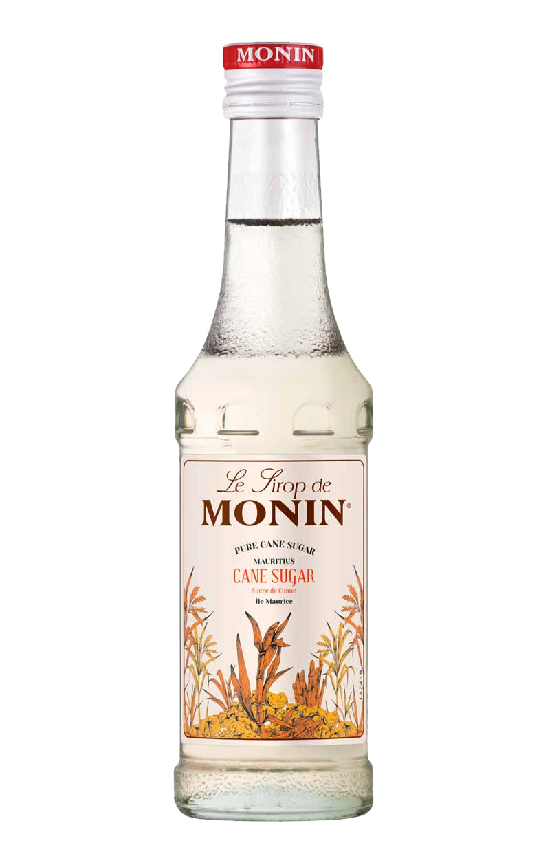 Une bouteille transparente de sirop Monin Sucre de Canne avec un bouchon rouge Monin et étiquette.