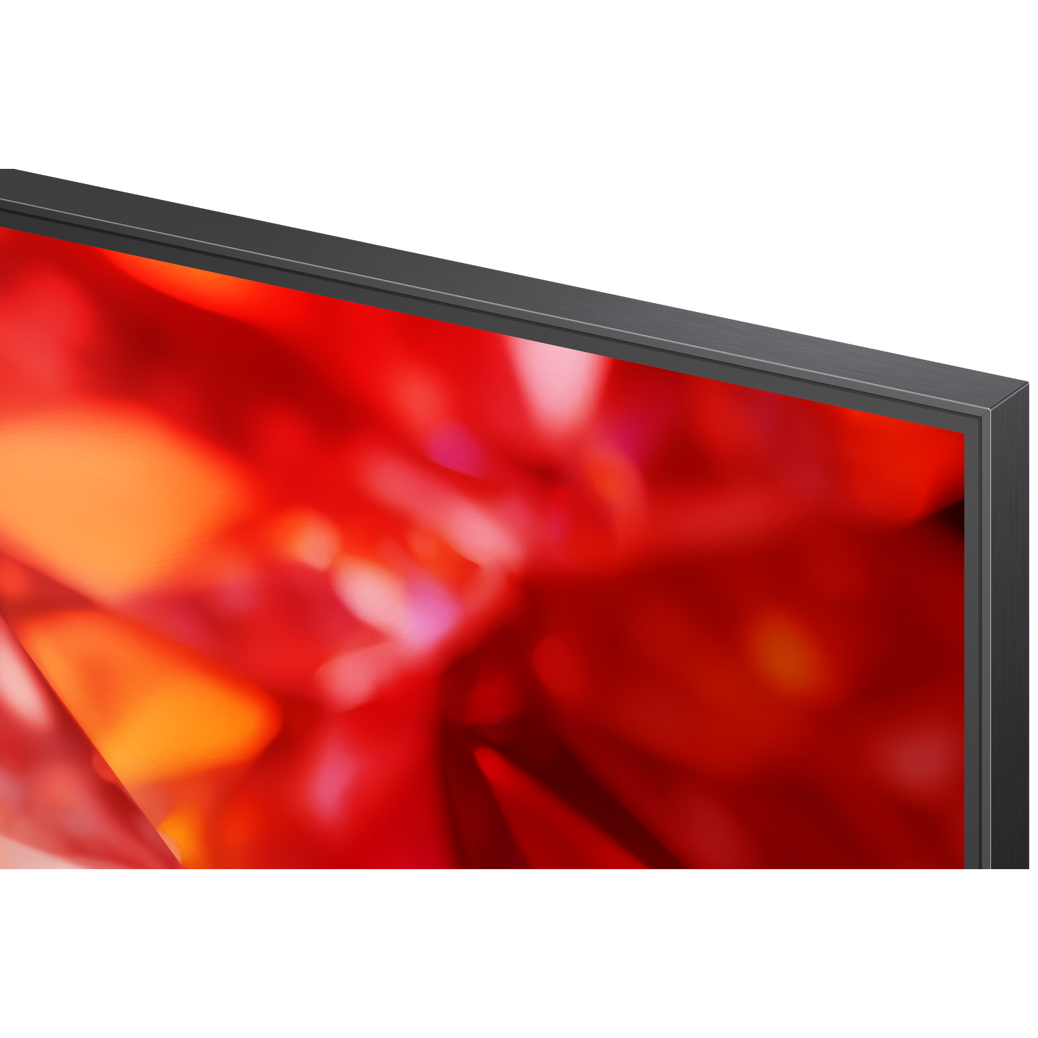 Close up of a TV with a red, blurred background and black frame.
