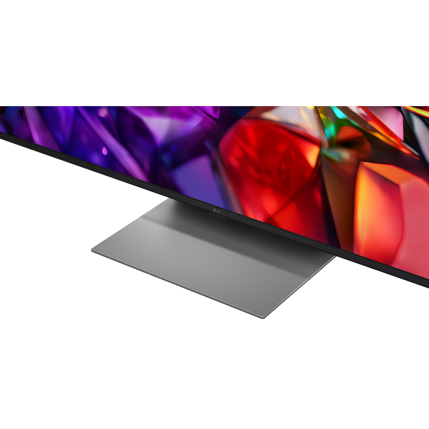 Een moderne tv met een strakke grijze standaard toont een levendig, abstract beeld met paarse en rode tinten.
