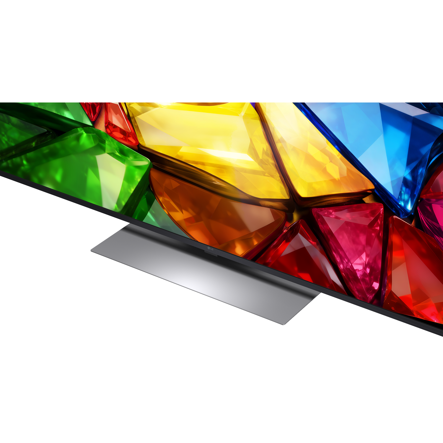 A modern TV displays a vibrant abstract image of colorful, faceted jewels.