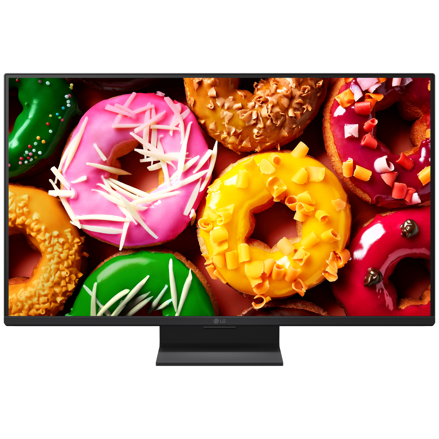 Close-up van kleurrijke donuts met glazuur en hagelslag op een monitorscherm.