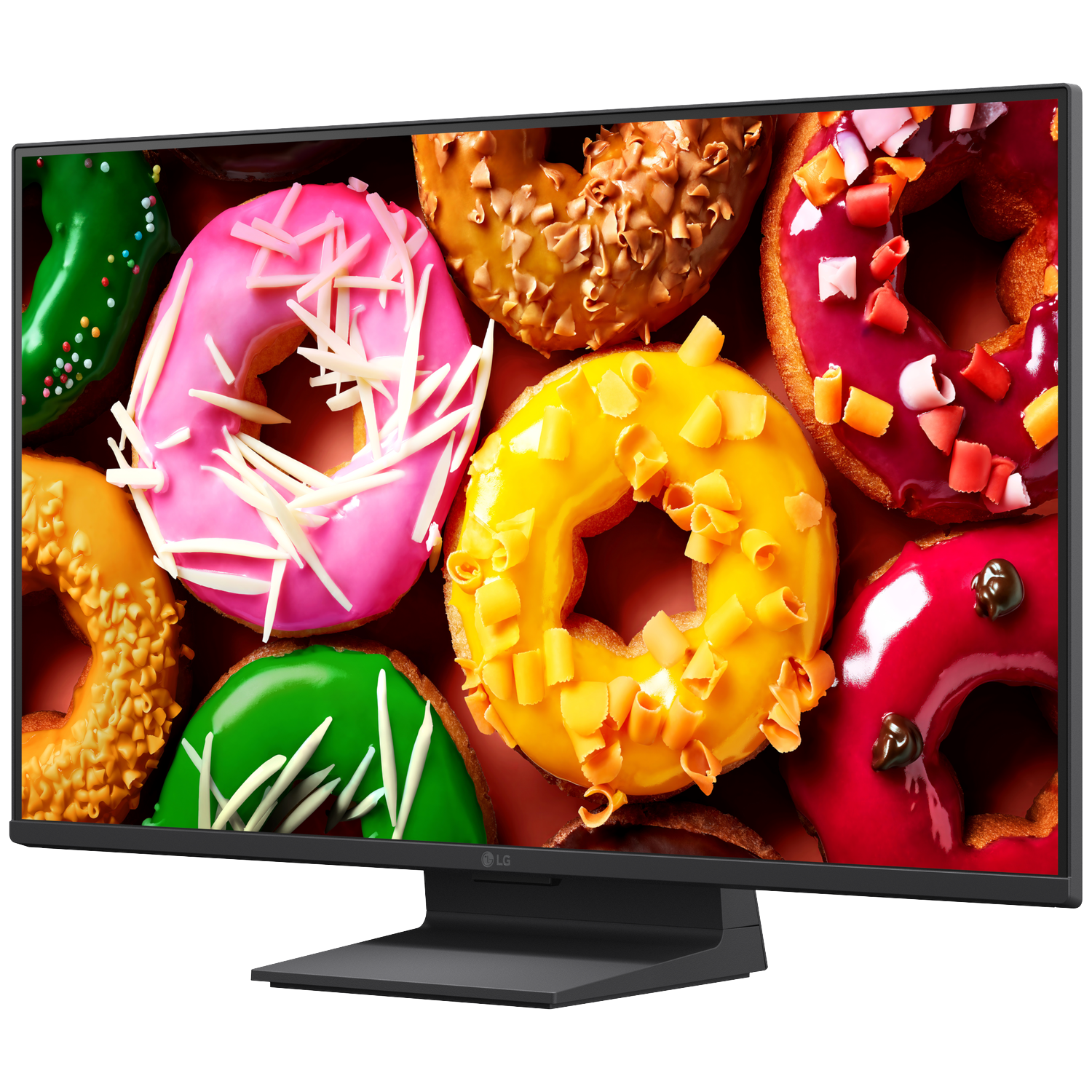 Een computermonitor toont een close-up van kleurrijke donuts met diverse toppings.