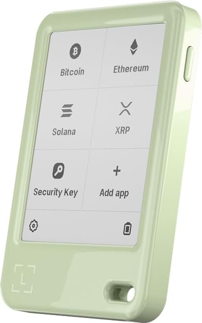 Ein hellgrünes Krypto-Hardware-Wallet mit einem Bildschirm, der Bitcoin, Ethereum, Solana, XRP anzeigt.