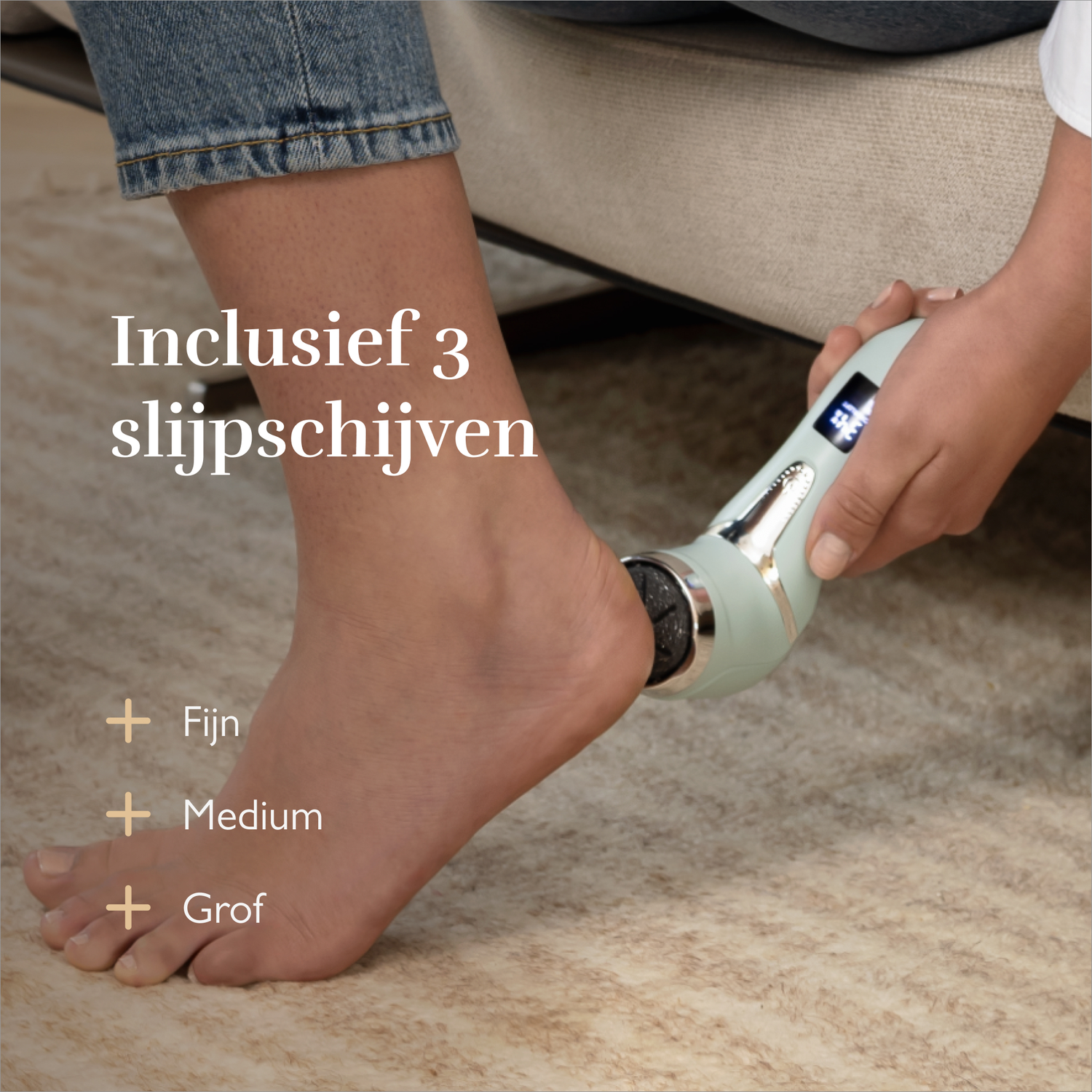 A foot is being treated by a light green device displaying three attachments.