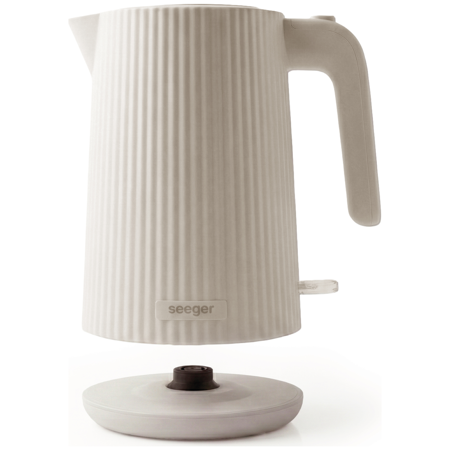 A beige kettle with a ribbed texture sits on its base. Seeger logo visible.