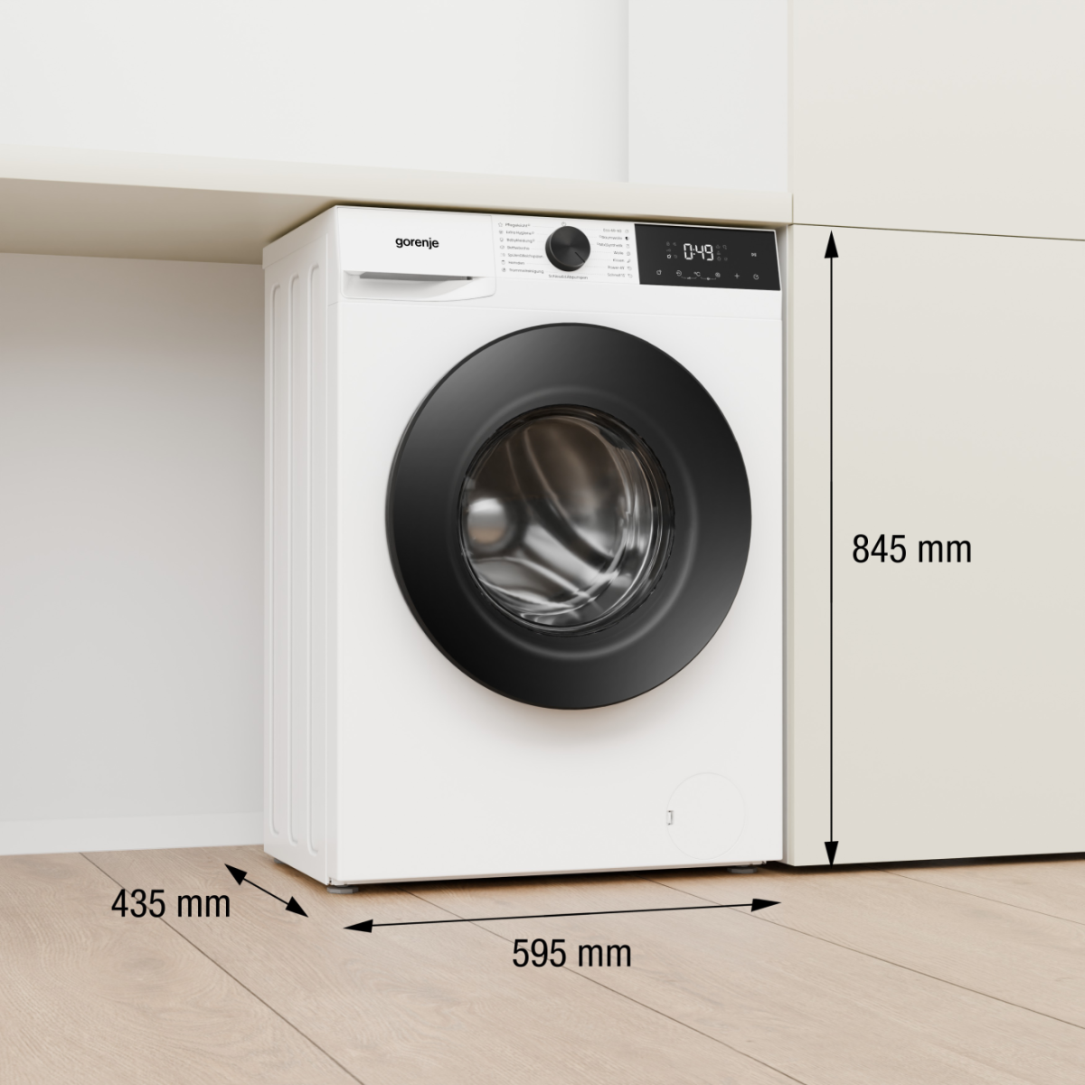 Weiße Gorenje Waschmaschine mit schwarzer Tür und Display, 595 mm breit.