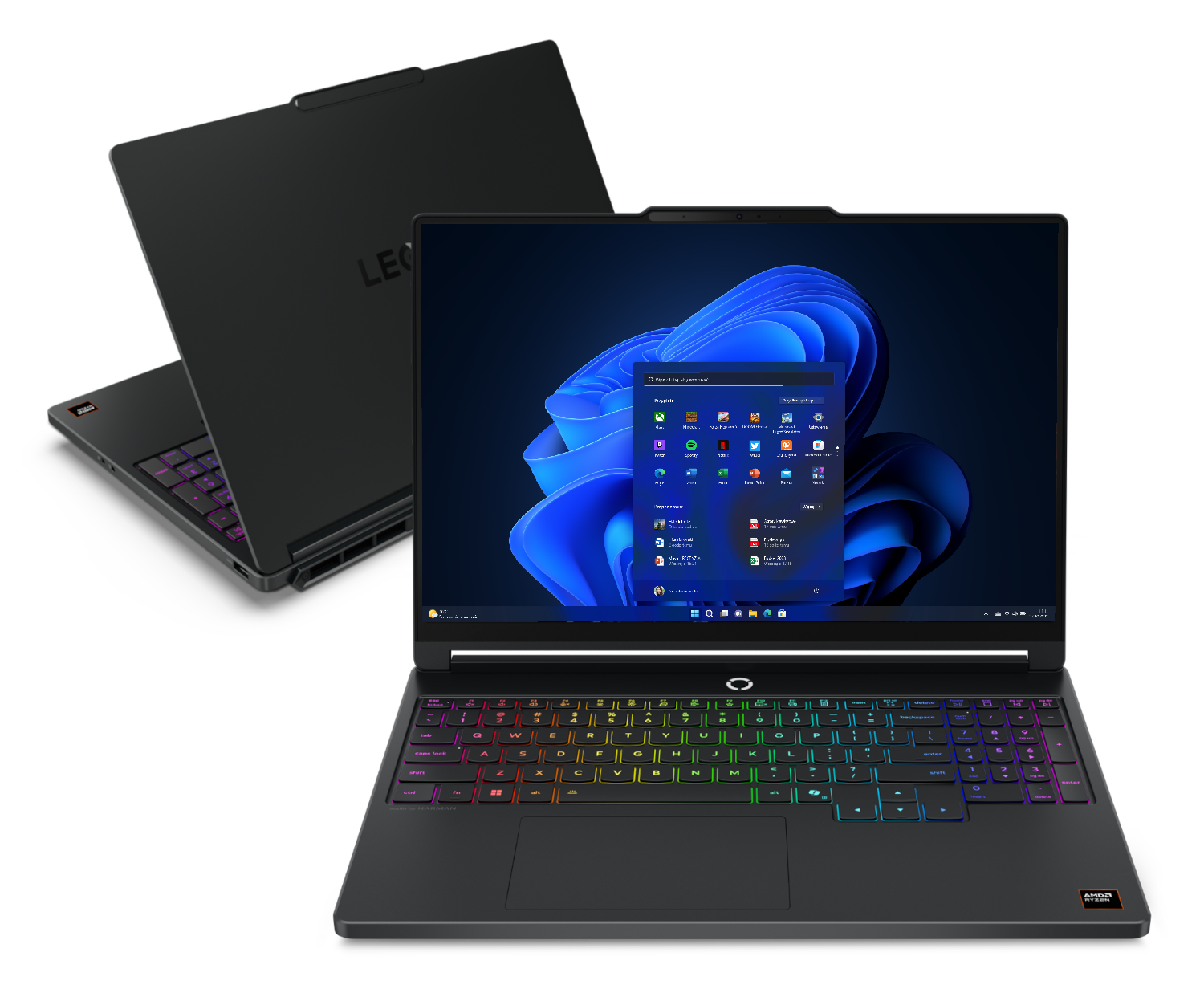 Dwa laptopy obok siebie, jeden otwarty z podświetlaną klawiaturą.