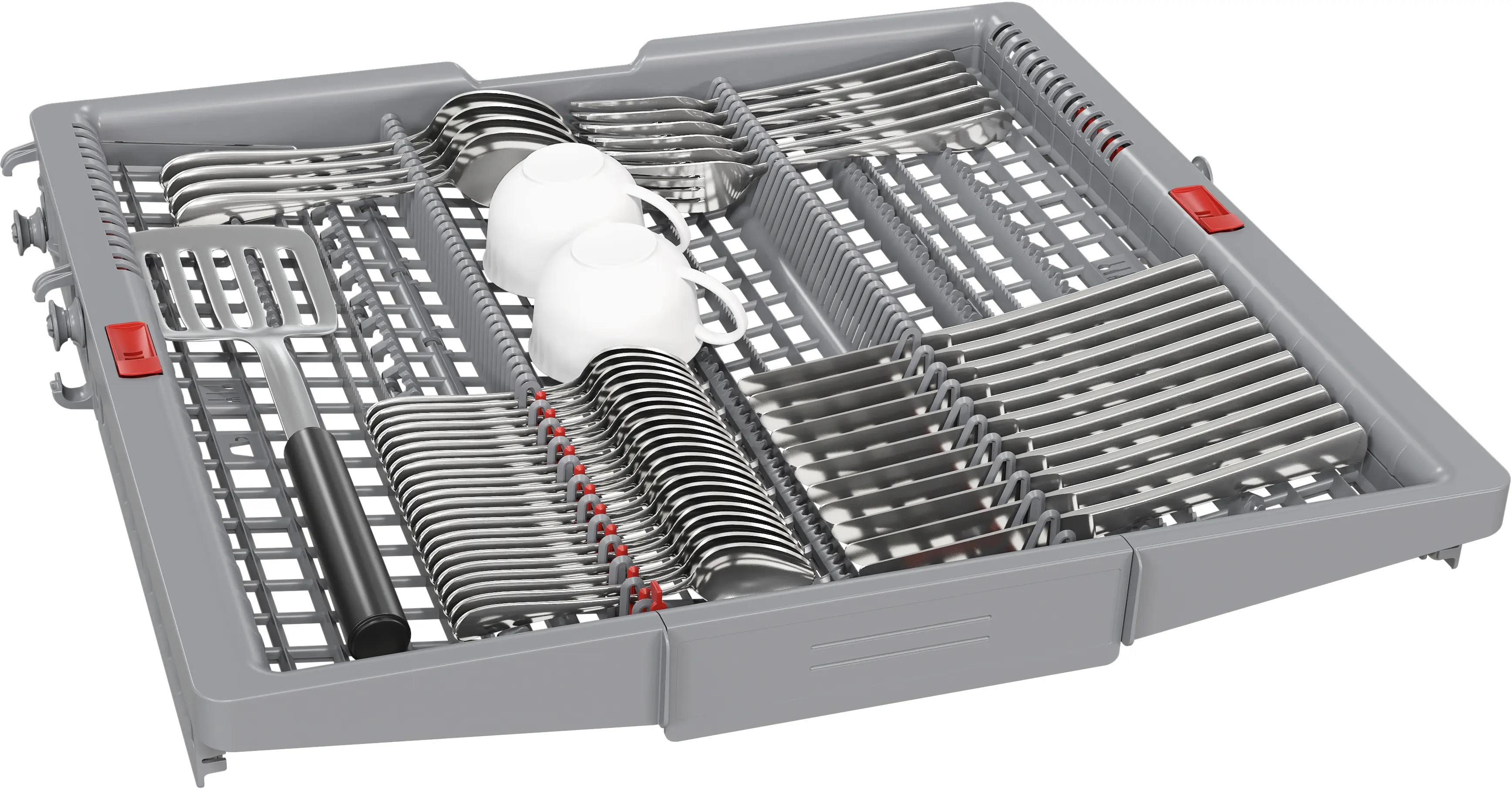 Kosz na sztućce do zmywarki ze sztućcami, dwoma białymi filiżankami i łopatką.