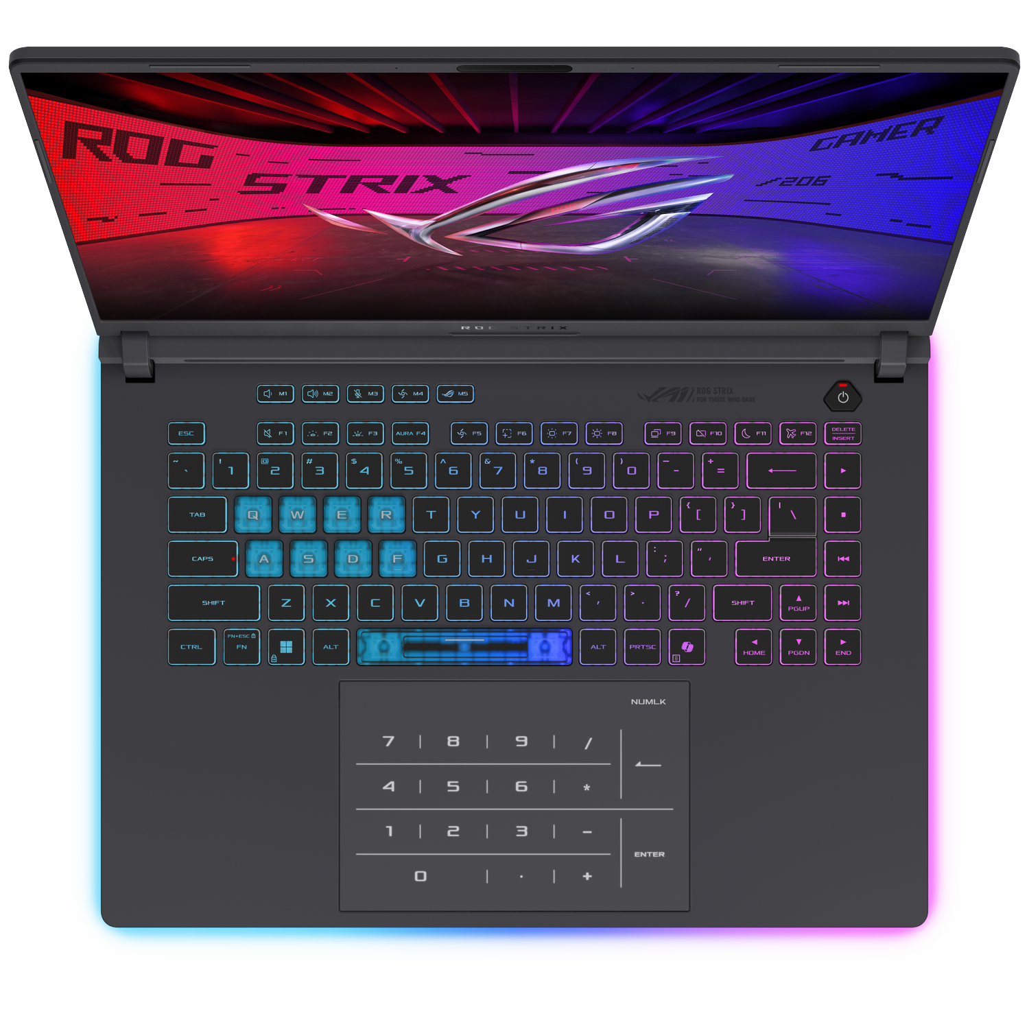 An open laptop with a backlit keyboard and ROG STRIX logo displayed on the screen.