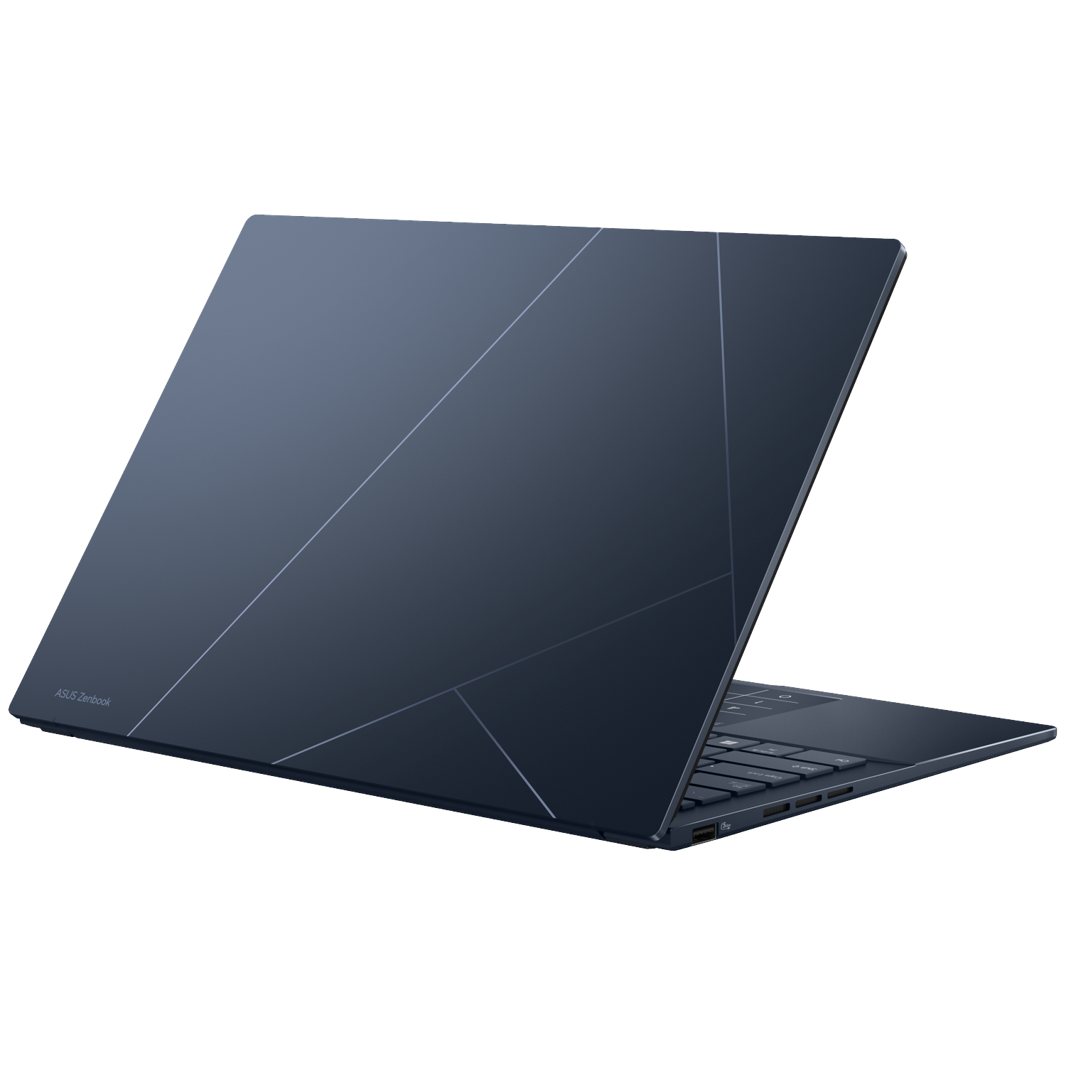 A closed dark blue laptop with a geometric pattern on the lid, viewed diagonally.