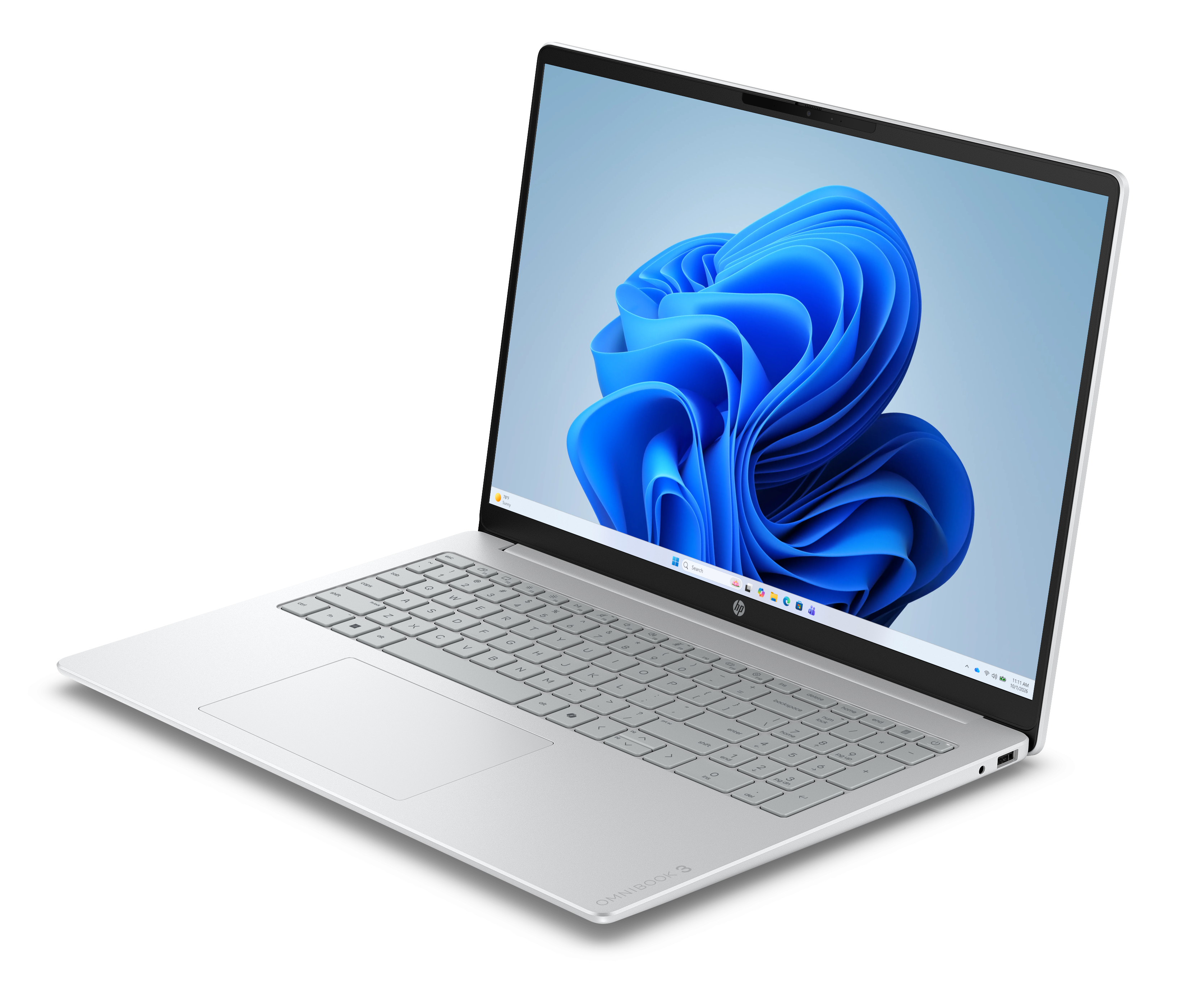 Srebrny laptop z niebieską tapetą systemu Windows.