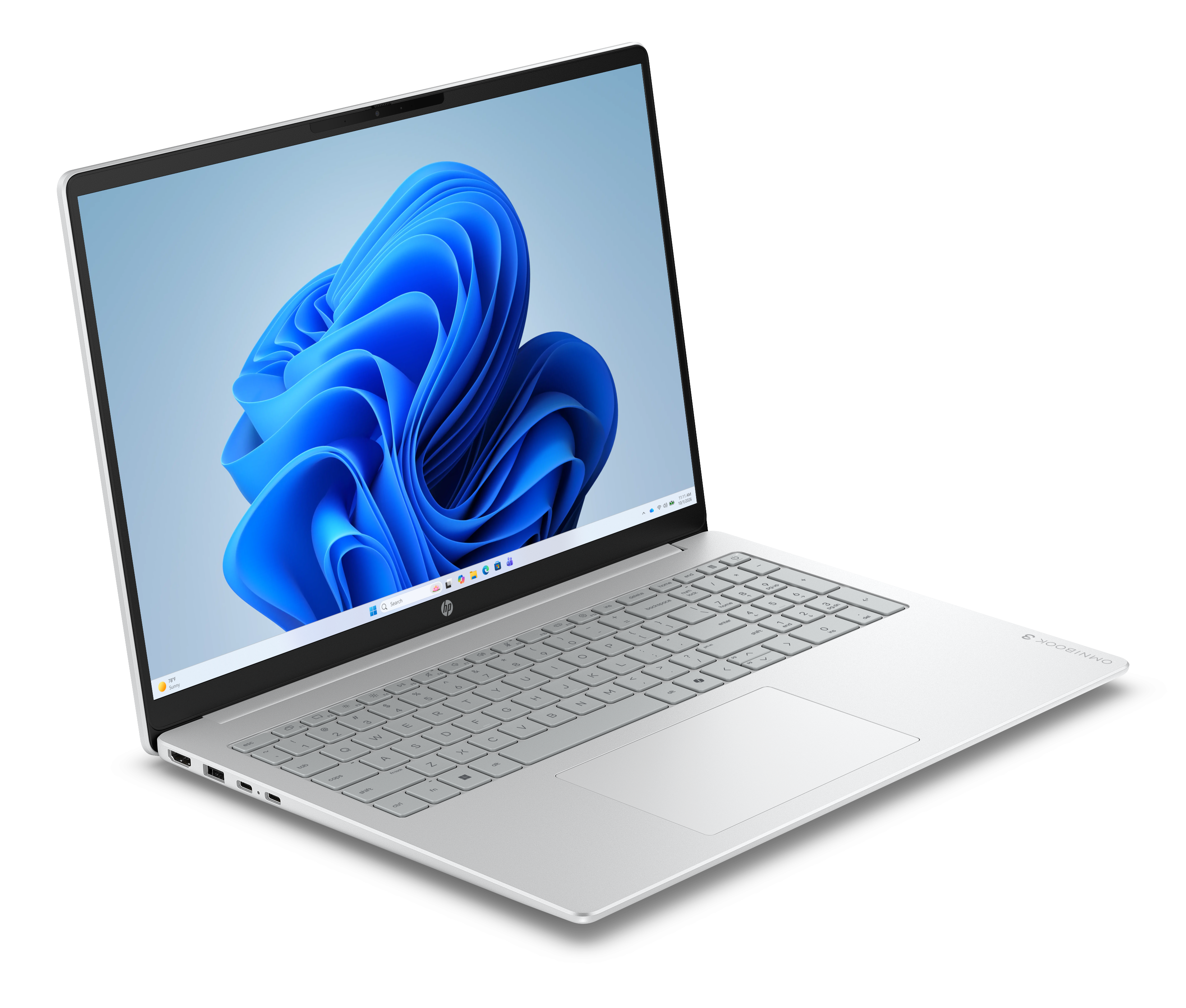 Srebrny laptop z otwartym ekranem, wyświetlający logo Windows 11.