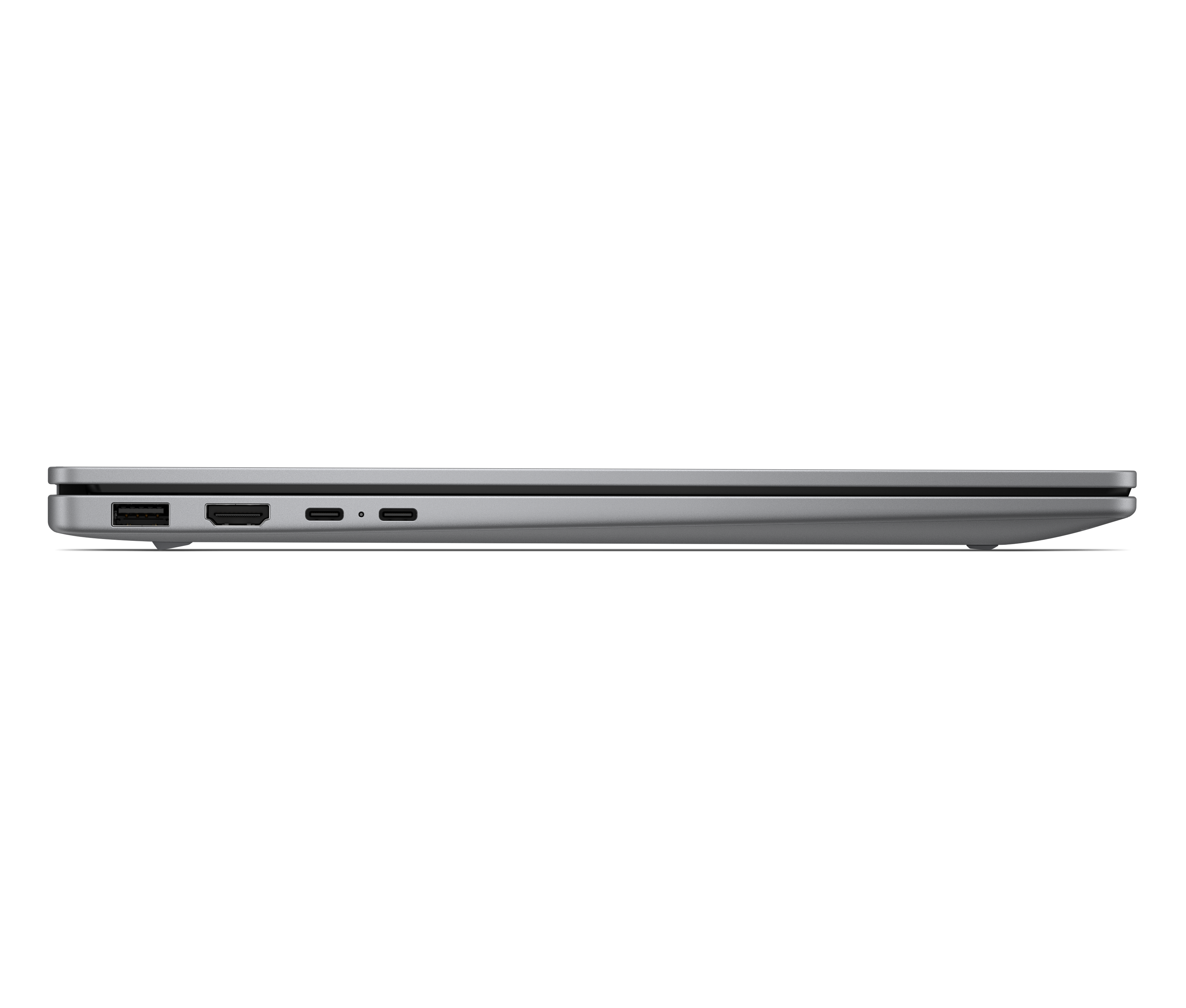 Srebrny laptop z boku, porty: USB-A, HDMI, 2x USB-C.