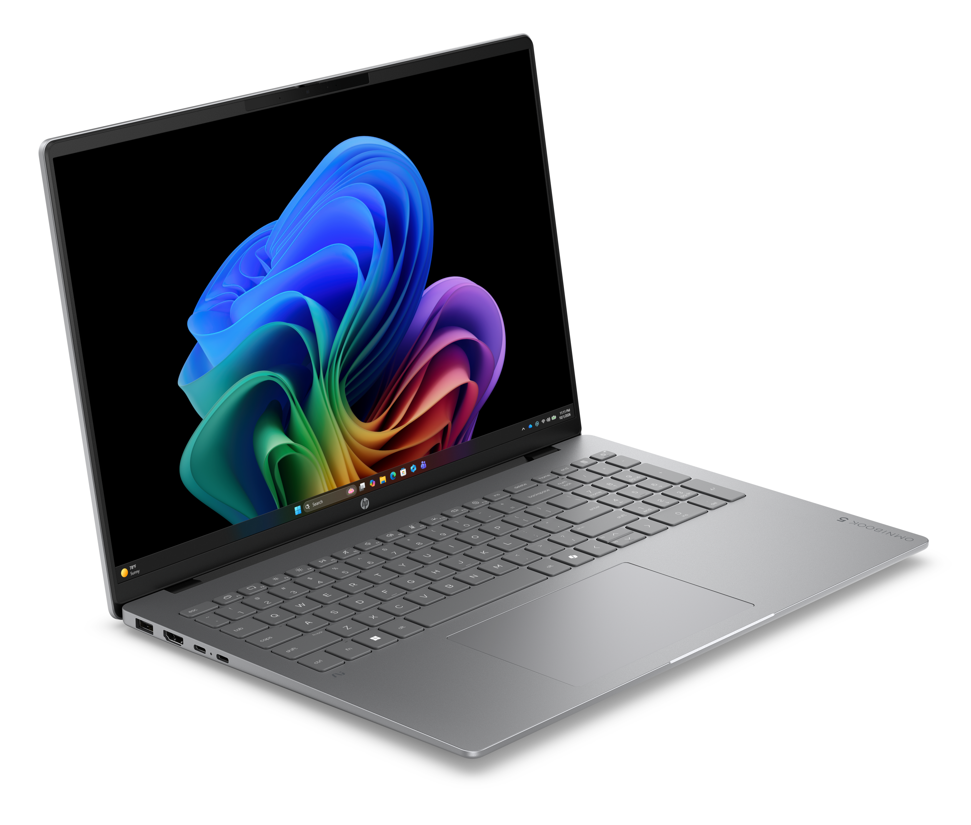 Srebrny laptop z kolorową tapetą i klawiaturą.