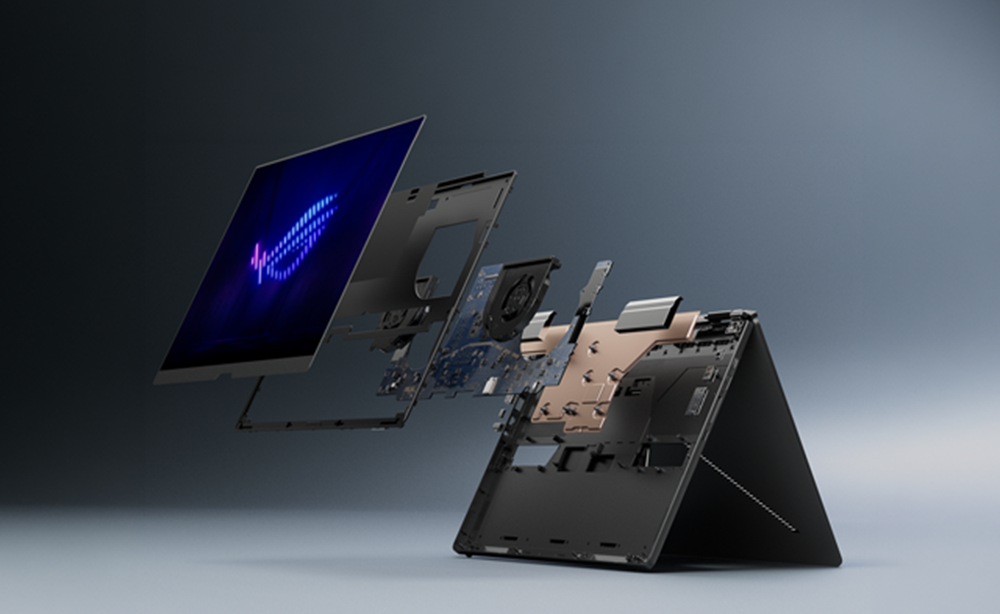 Explosionsansicht eines Laptops, die interne Komponenten vor grauem Hintergrund zeigt.