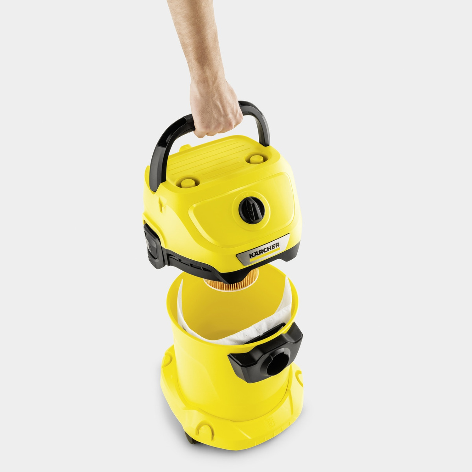 Aspirapolvere Kärcher giallo con manico nero, filtro visibile.