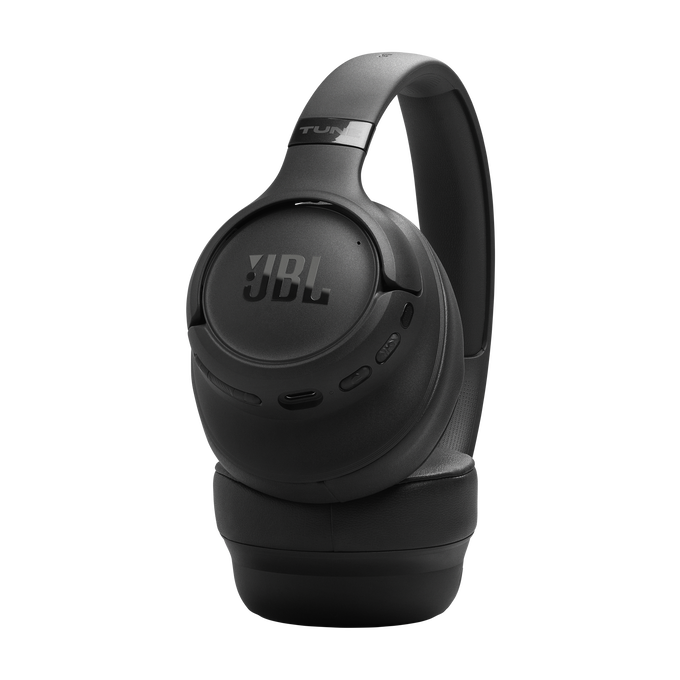 Auriculares JBL negros con logo Tune sobre fondo negro.