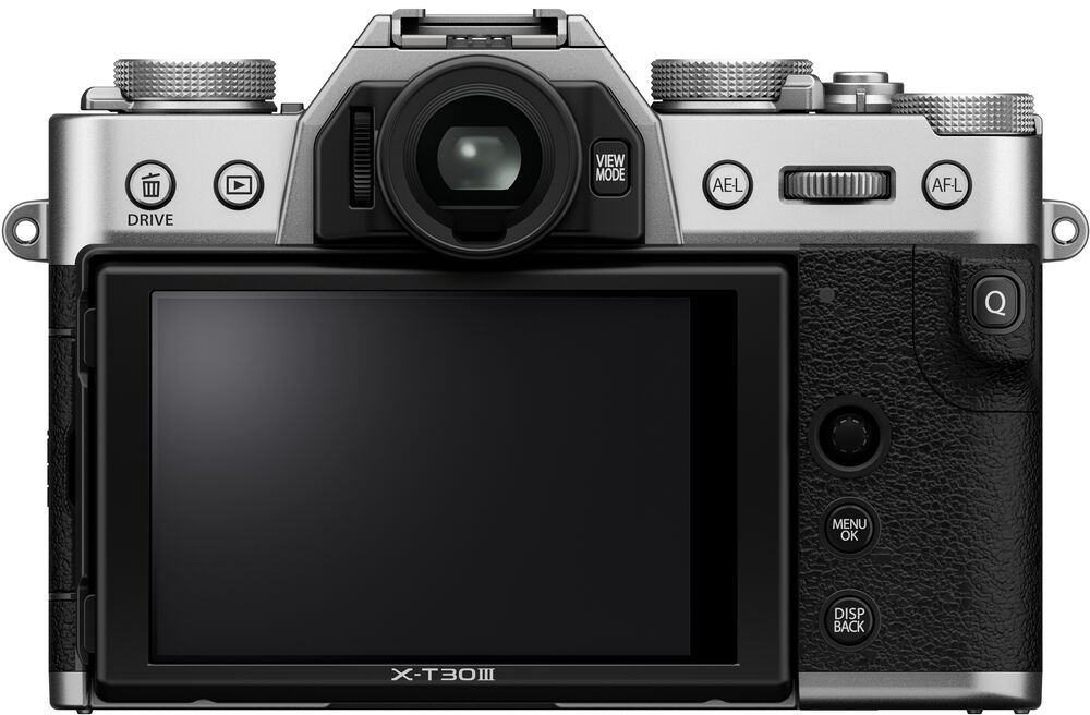 Ezüst Fujifilm fényképezőgép hátulnézete fekete képernyővel és gombokkal.