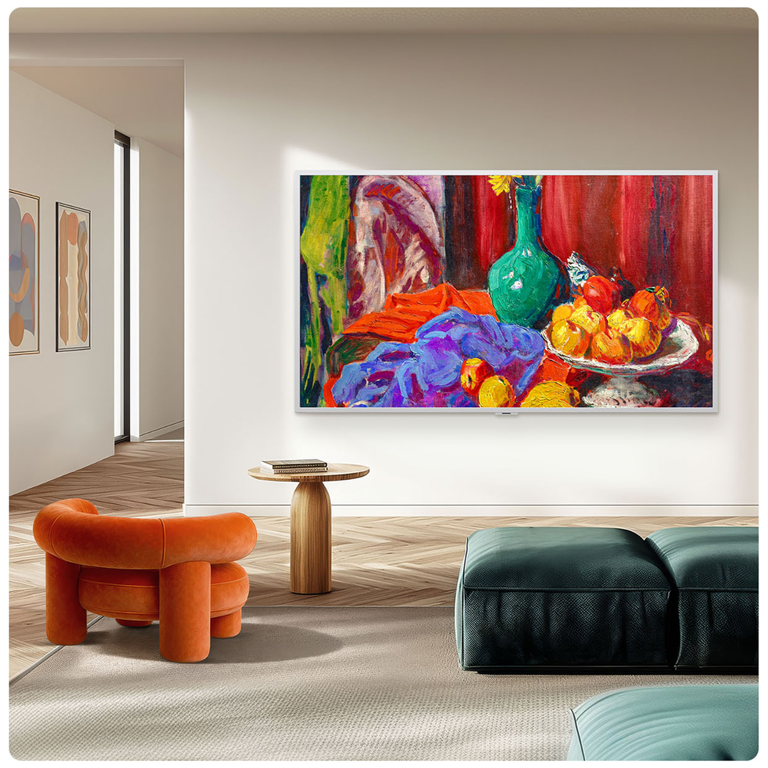 A living room with a TV displaying a still life painting and an orange armchair.