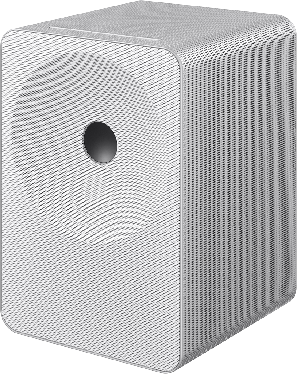 Un haut-parleur cube blanc avec un petit cercle noir au centre.