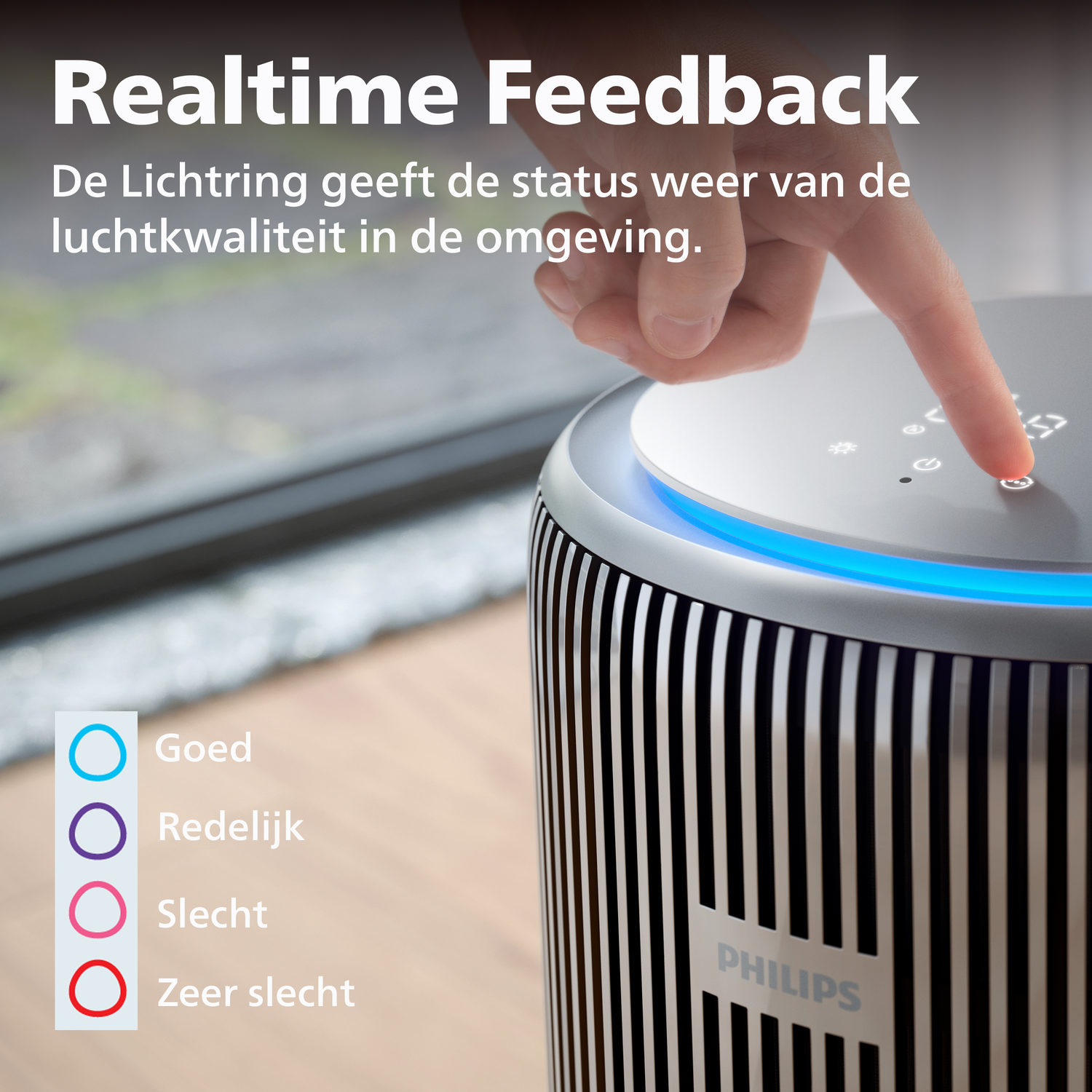 A Philips air purifier with a blue light ring indicates air quality status.