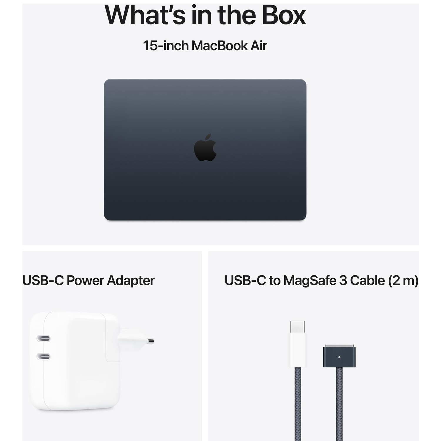 Een donkere MacBook Air met Apple logo, stroomadapter en MagSafe-kabel.