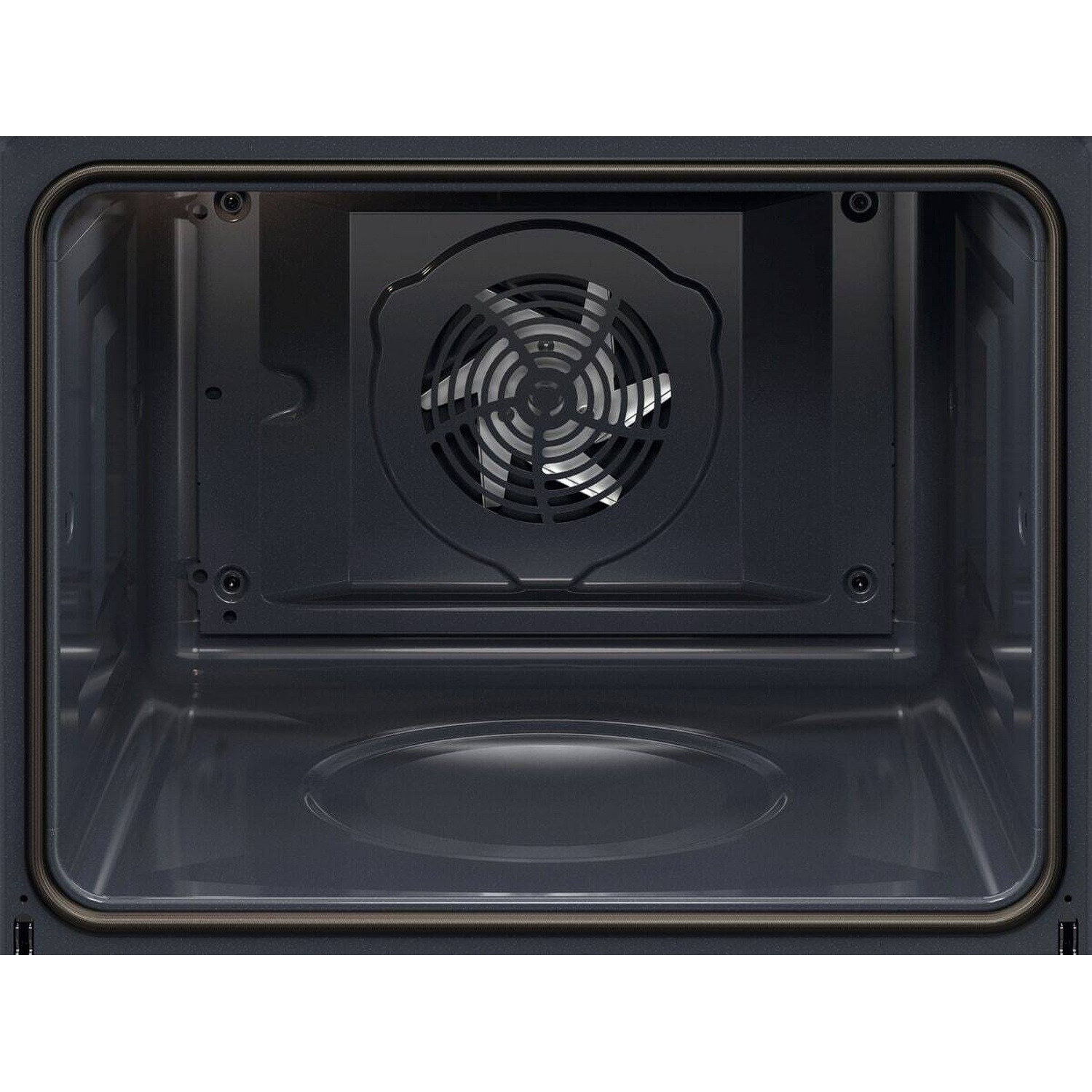 Vista interna di un forno scuro con griglia del ventilatore sulla parete posteriore.