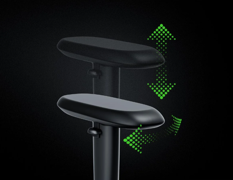 Regulowane podłokietniki krzesła z zielonymi strzałkami wskazującymi ruch w górę/dół.