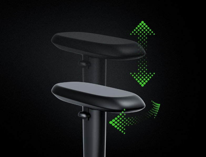 Czarne podłokietniki krzesła z zielonymi strzałkami wskazującymi ruch w górę i w dół.