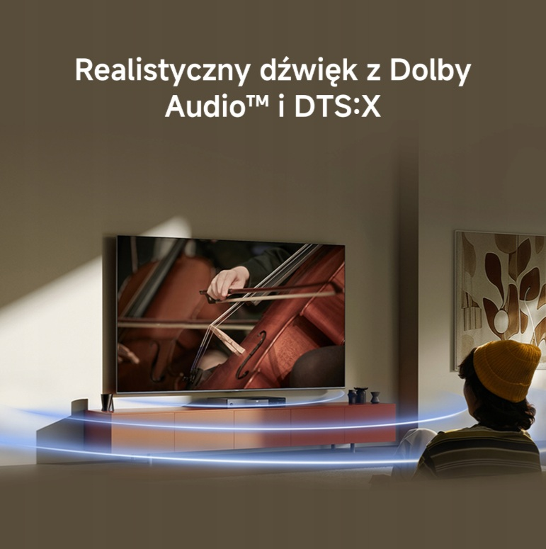 Osoba ogląda TV. Na ekranie gra wiolonczelista. Realistyczny dźwięk z Dolby.