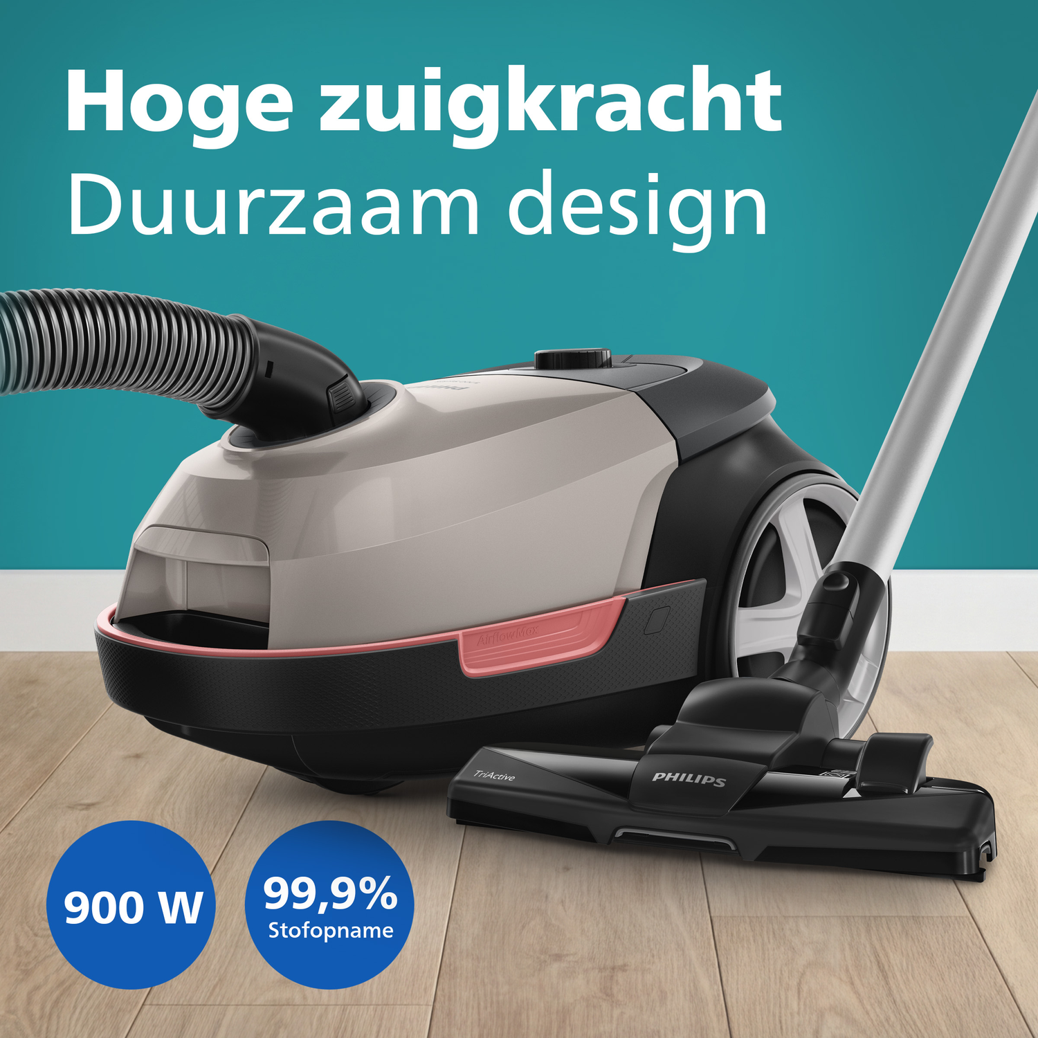 A beige Philips vacuum cleaner with hose, brush, and two blue circles showing power specs.