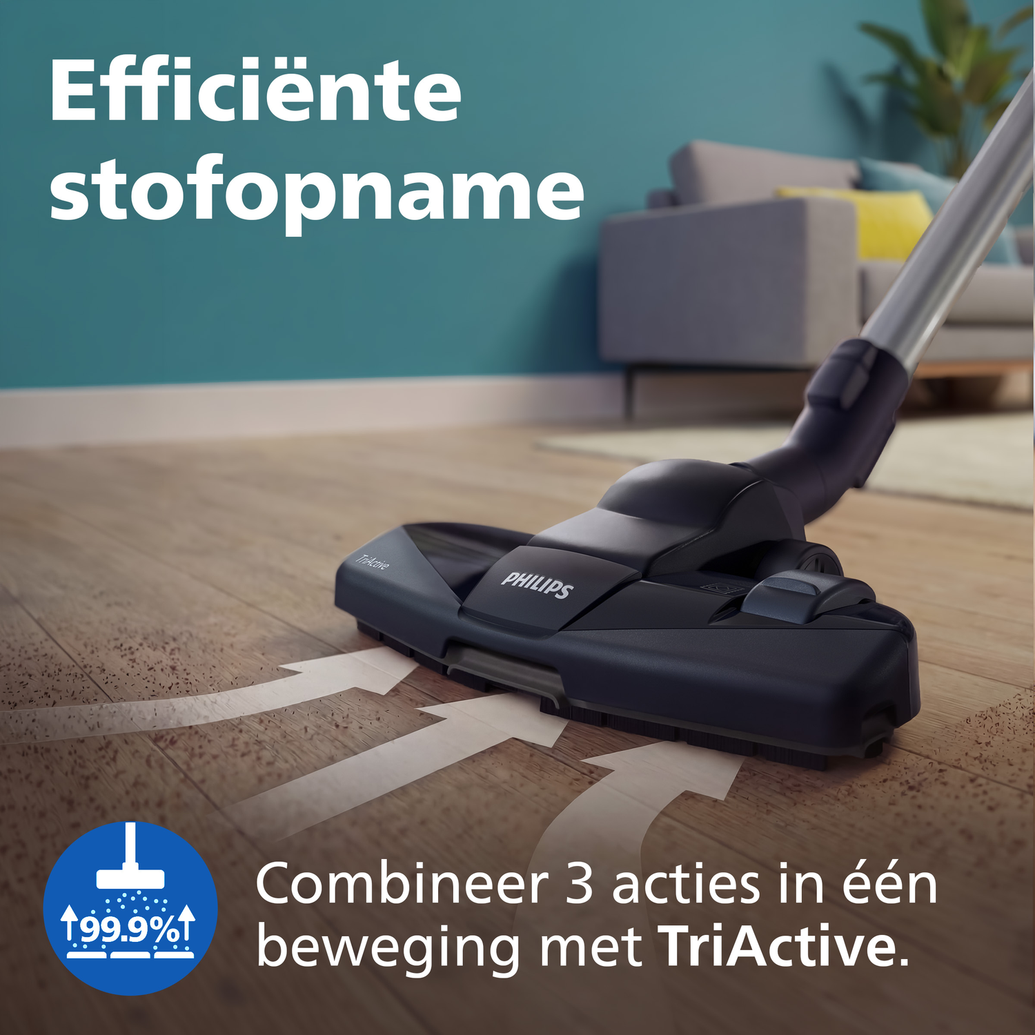 Philips vacuum cleaner nozzle on wooden floor. Text: Efficient dust pick-up.