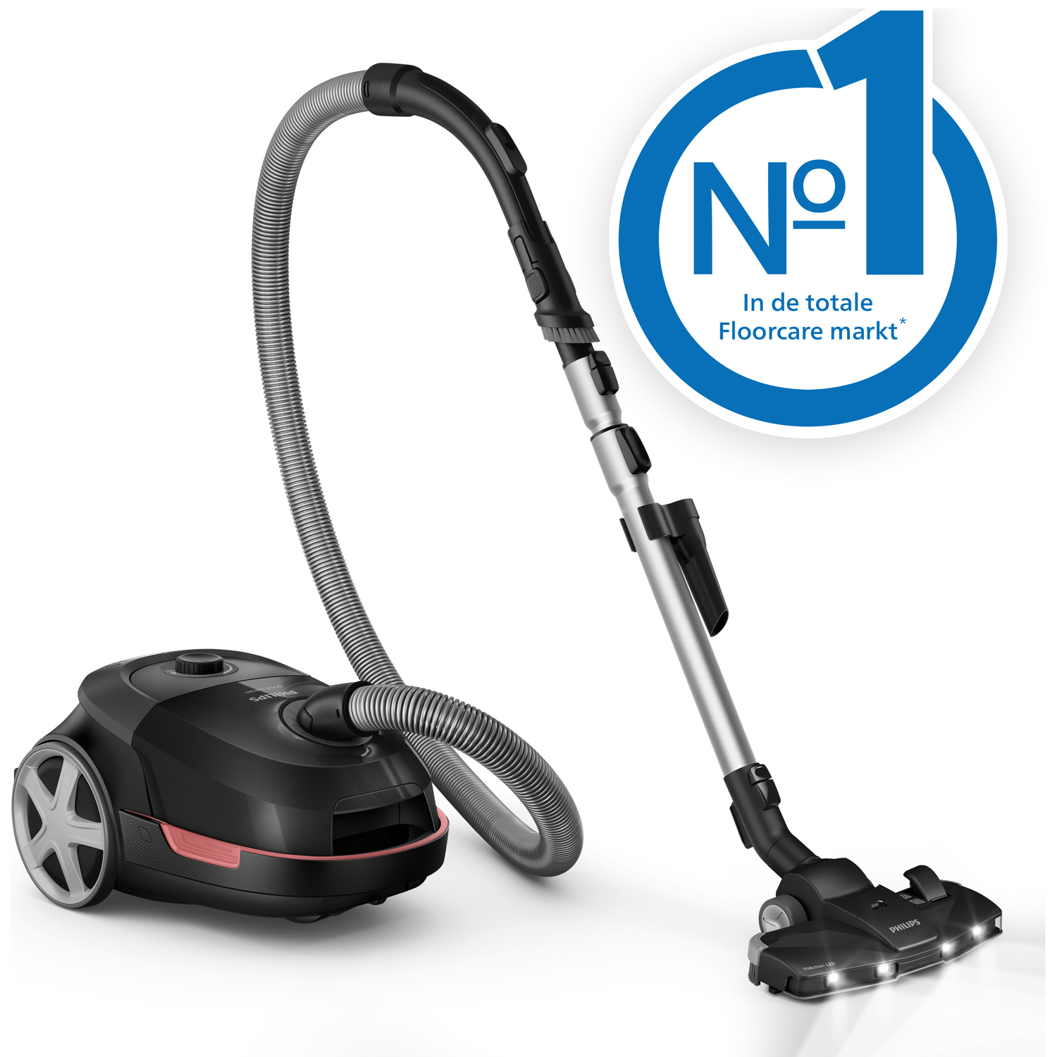 Zwarte Philips stofzuiger met slang en mondstuk. "Nr. 1" logo.