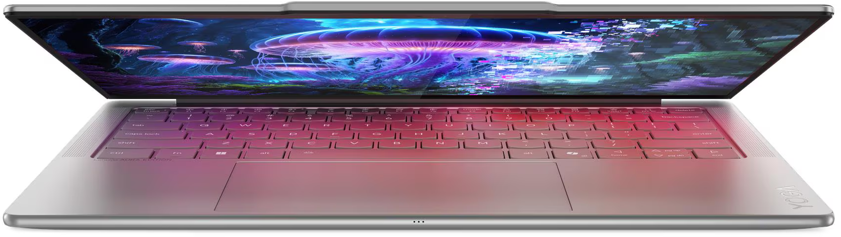 Egy nyitott laptop képernyőjén víz alatti jelenet látható, rózsaszín billentyűzet-háttérvilágítással.