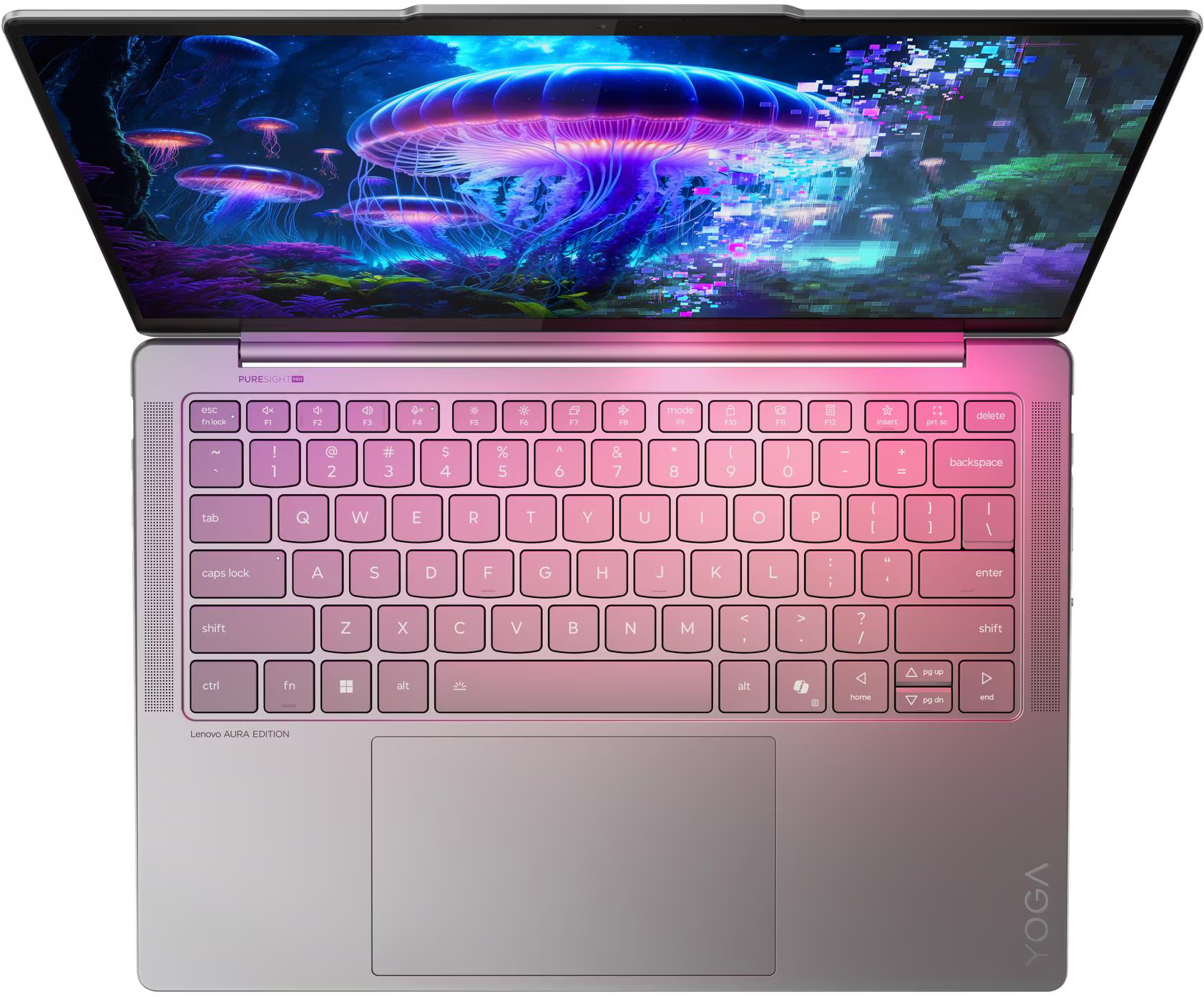 Egy nyitott laptop vibráló víz alatti képernyőháttérrel és rózsaszín billentyűzettel.