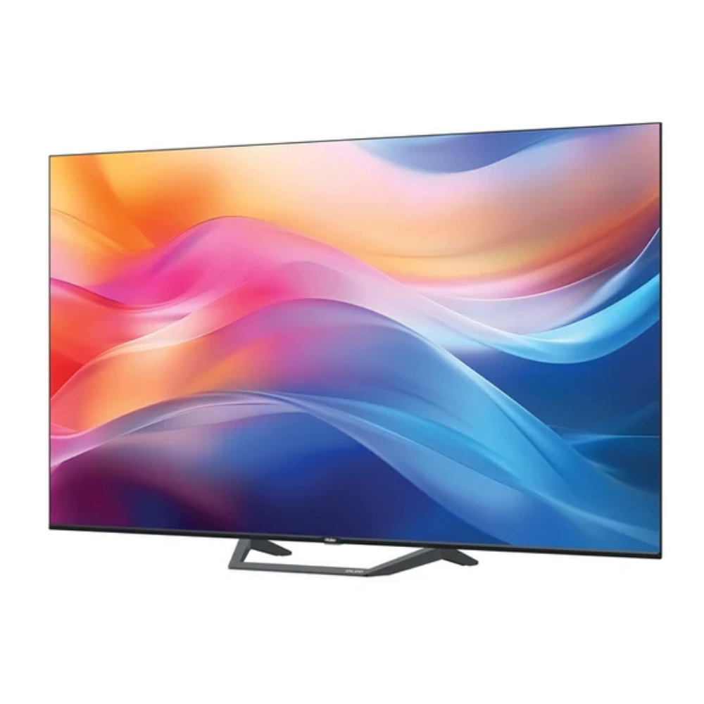 Un televisor moderno con gráficos abstractos y coloridos en pantalla, con soporte negro.