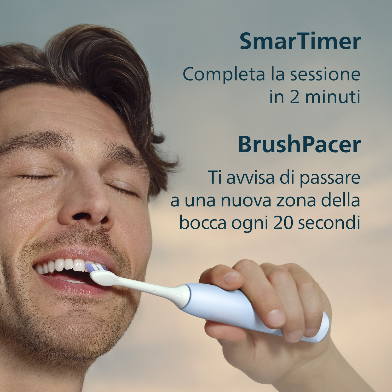 Uomo si lava denti con spazzolino elettrico, sfondo cielo.