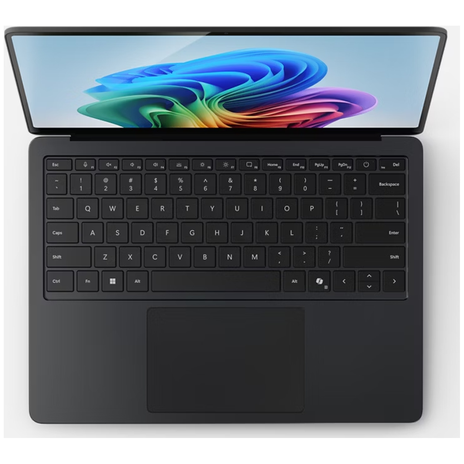 A dark laptop with its screen open, displaying a colorful abstract image.