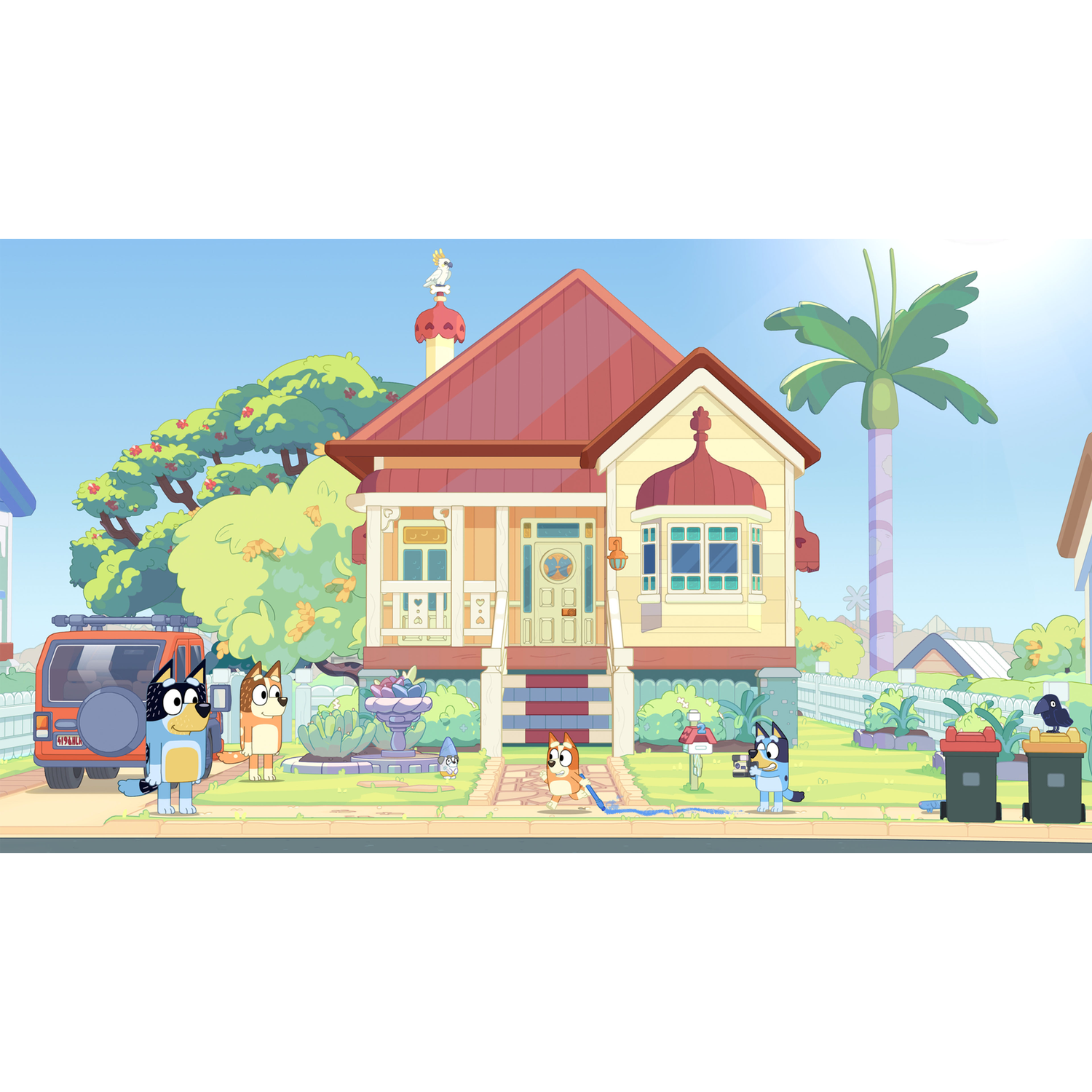 A dog family in front of a house with a red car and trash cans.