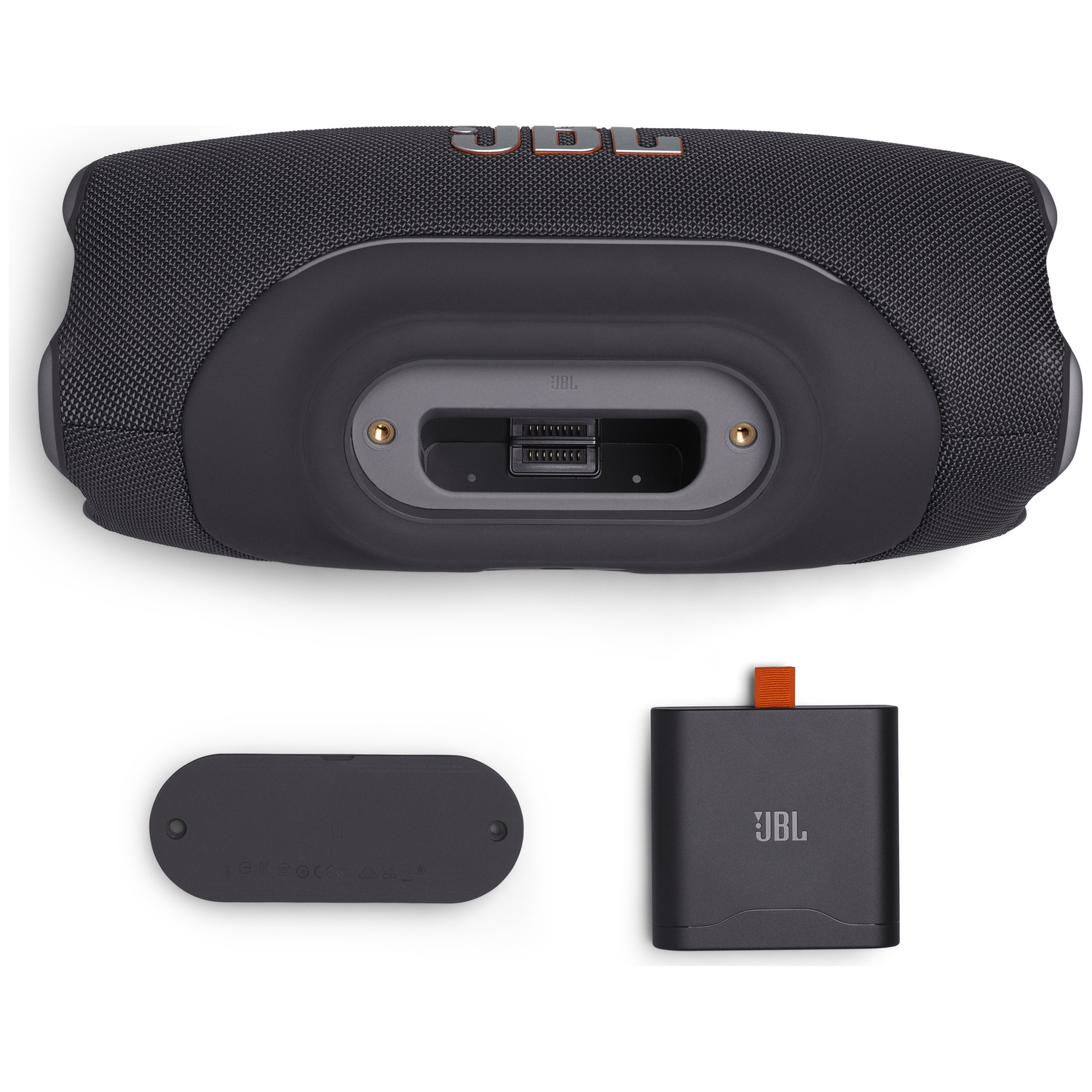 Black JBL speaker with charging port and accessories.
