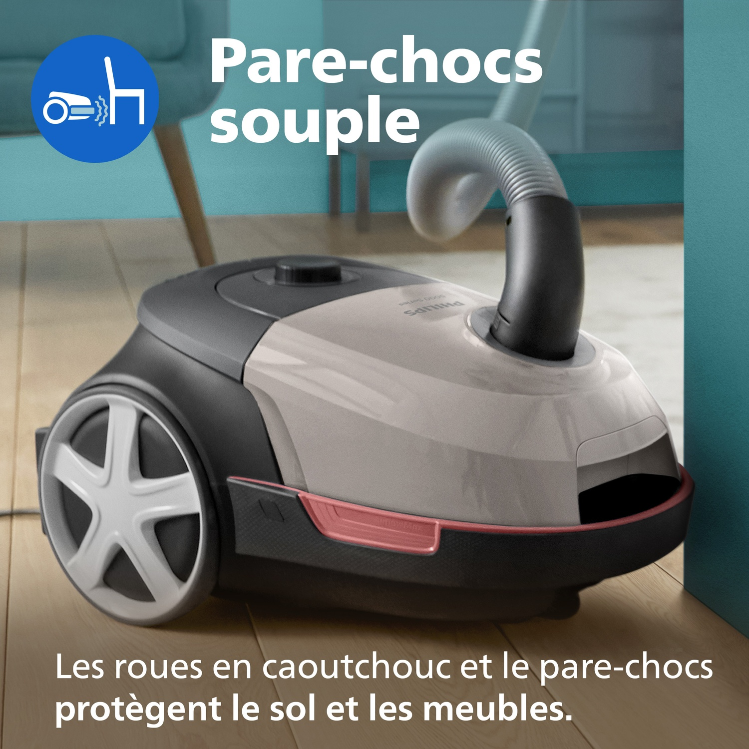 Un aspirateur Philips avec roues et pare-chocs en caoutchouc protège sols et meubles.