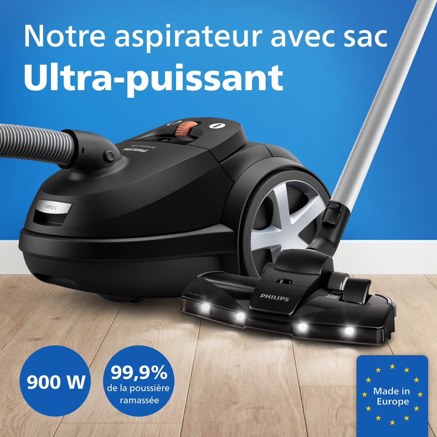 Aspirateur Philips noir avec tuyau, brosse et sceau "Made in Europe".