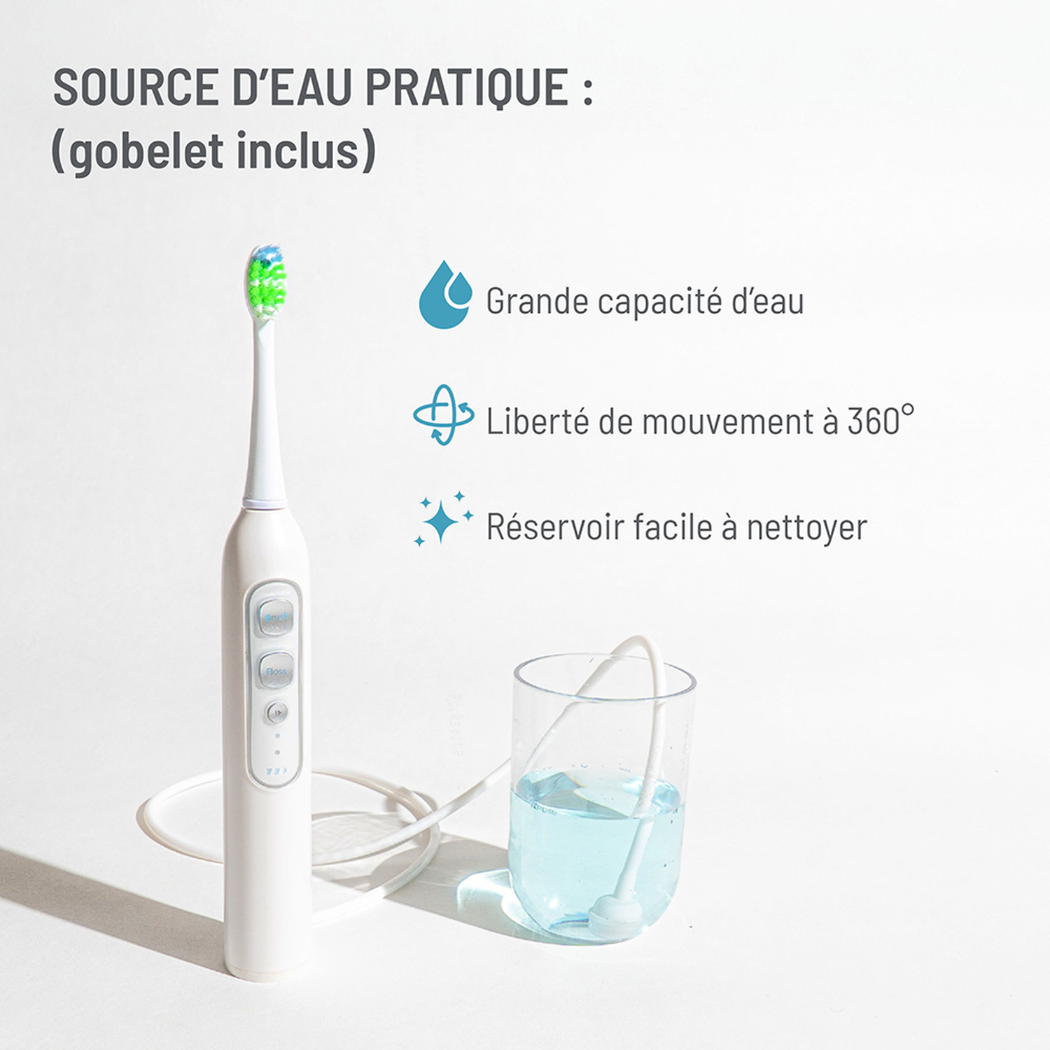 Electric toothbrush with cup and water, highlighting features.