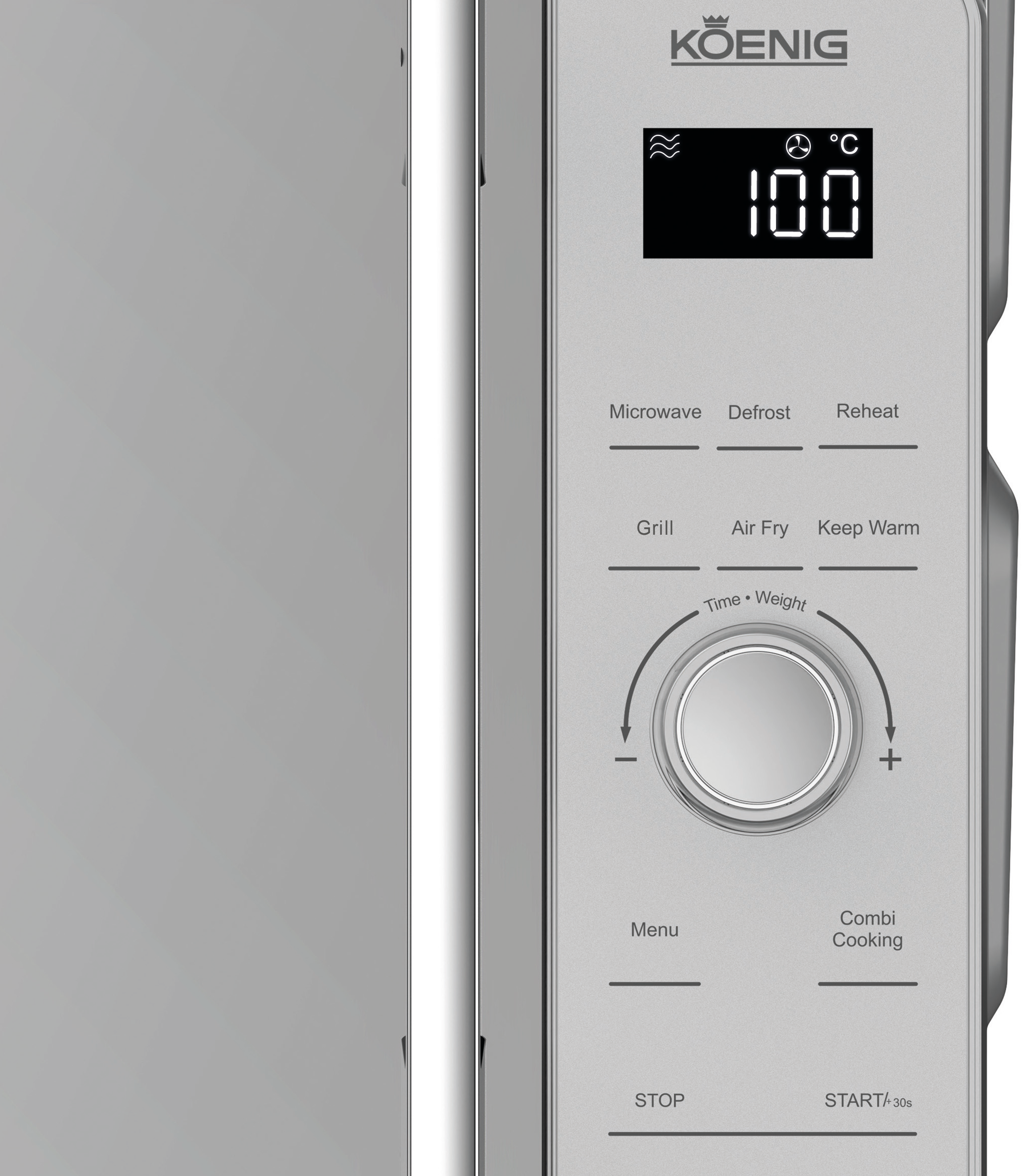 Panneau de commande argenté d'un four à micro-ondes, avec écran numérique, boutons et commandes.