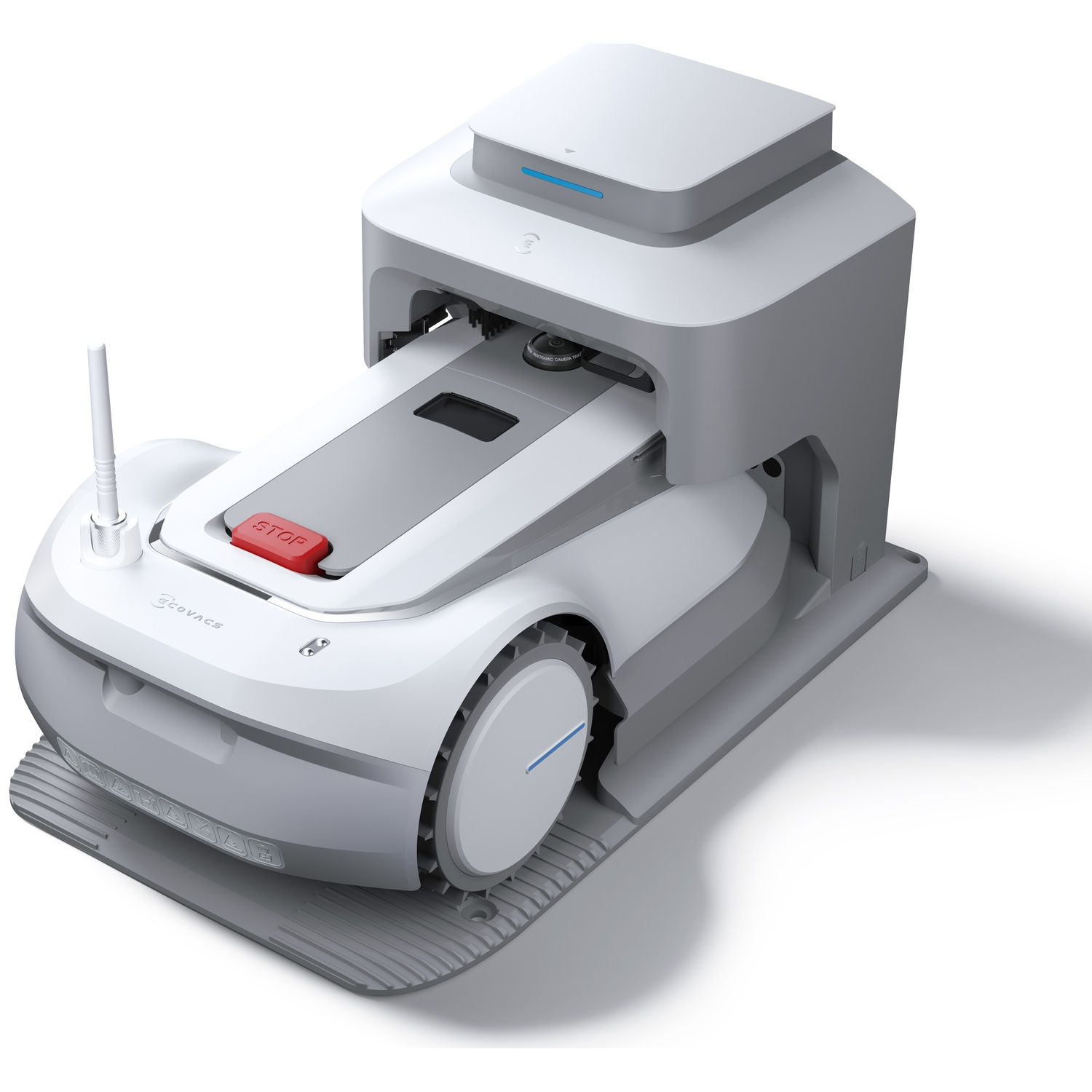 A white robotic vacuum cleaner with a red stop button and an antenna on a gray charging dock.