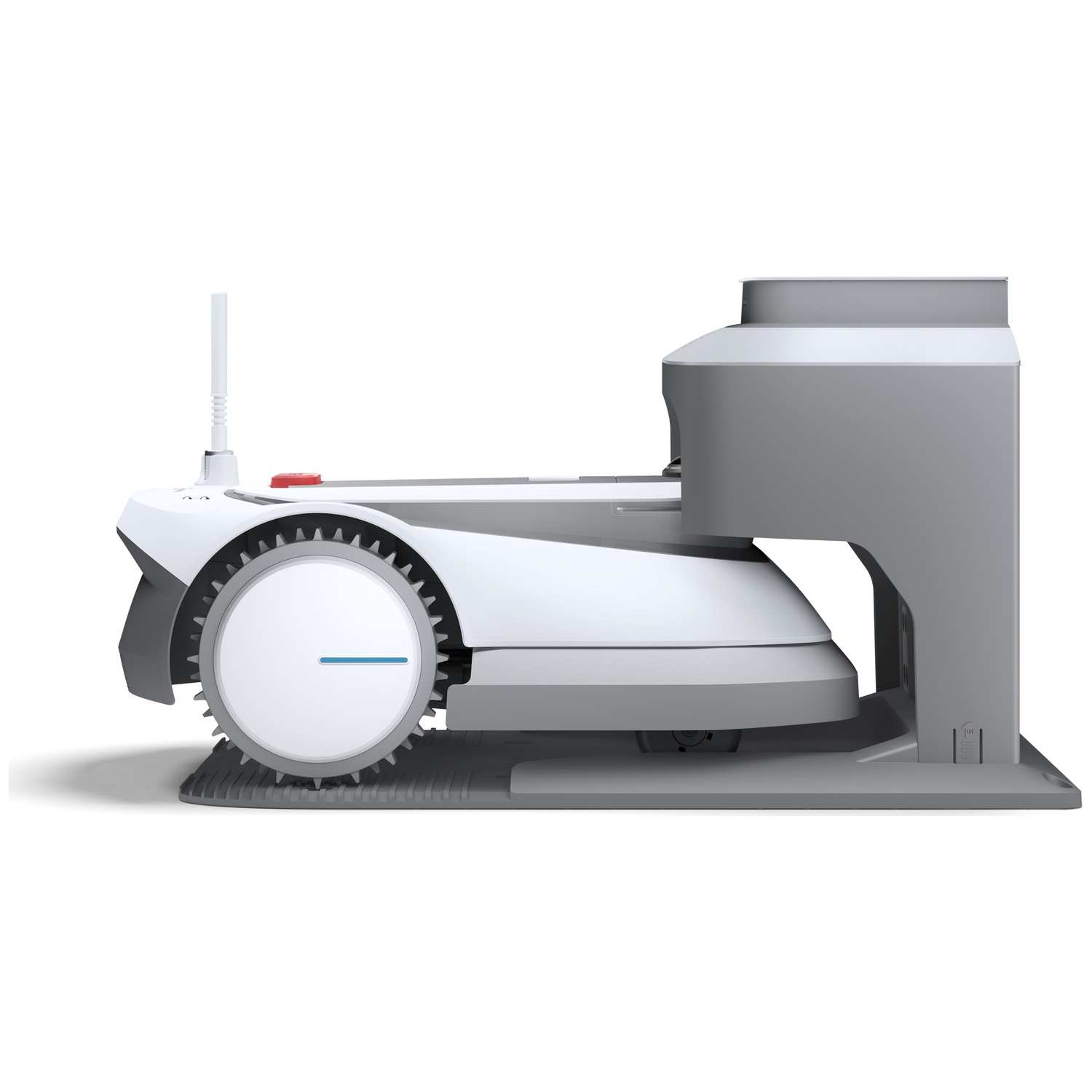 A white and gray robotic lawn mower sits on a charging station.