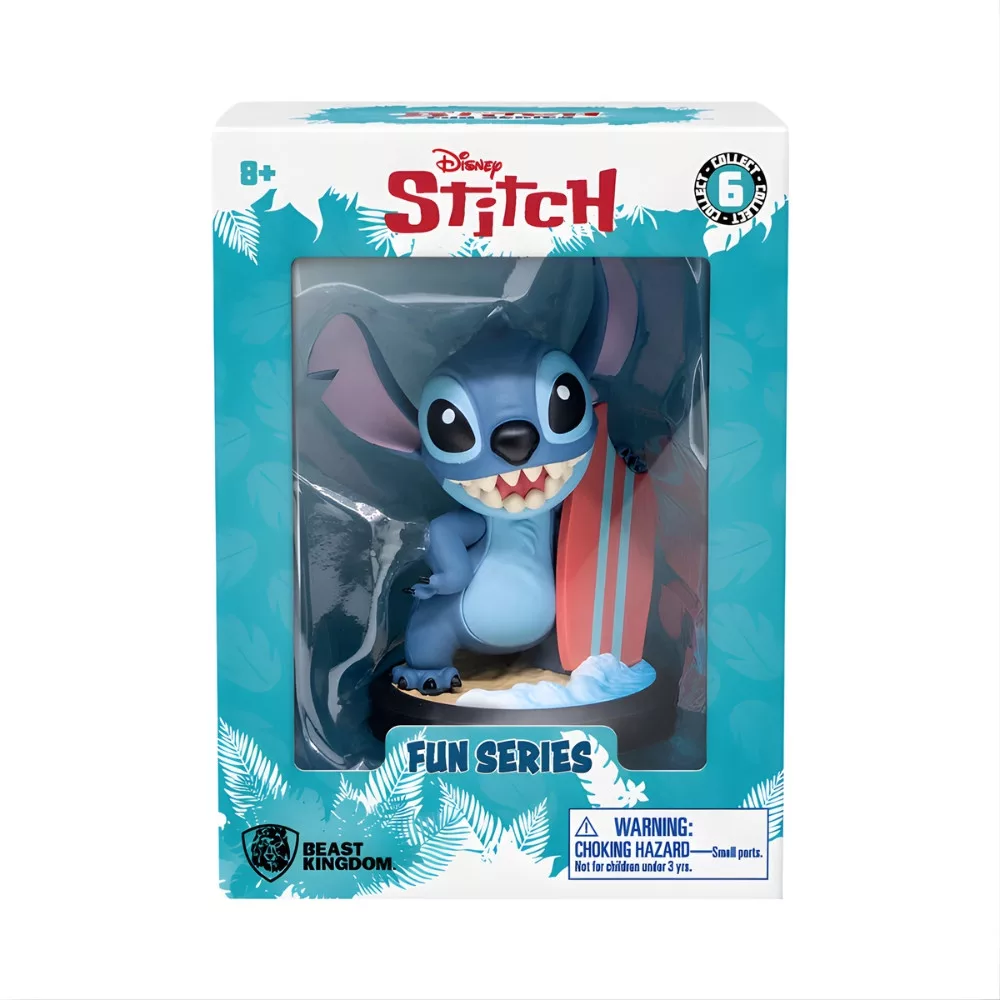 Kék Stitch figura szörfdeszkával, kék, levelekkel díszített dobozban.