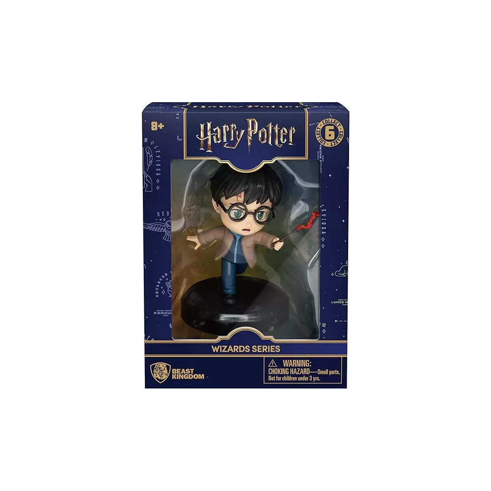 Harry Potter figura dobozban, piros végű varázspálcát tart.